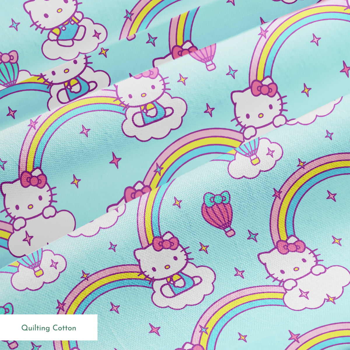 Hello Kitty® Rainbows & Clouds on Blue Fabric