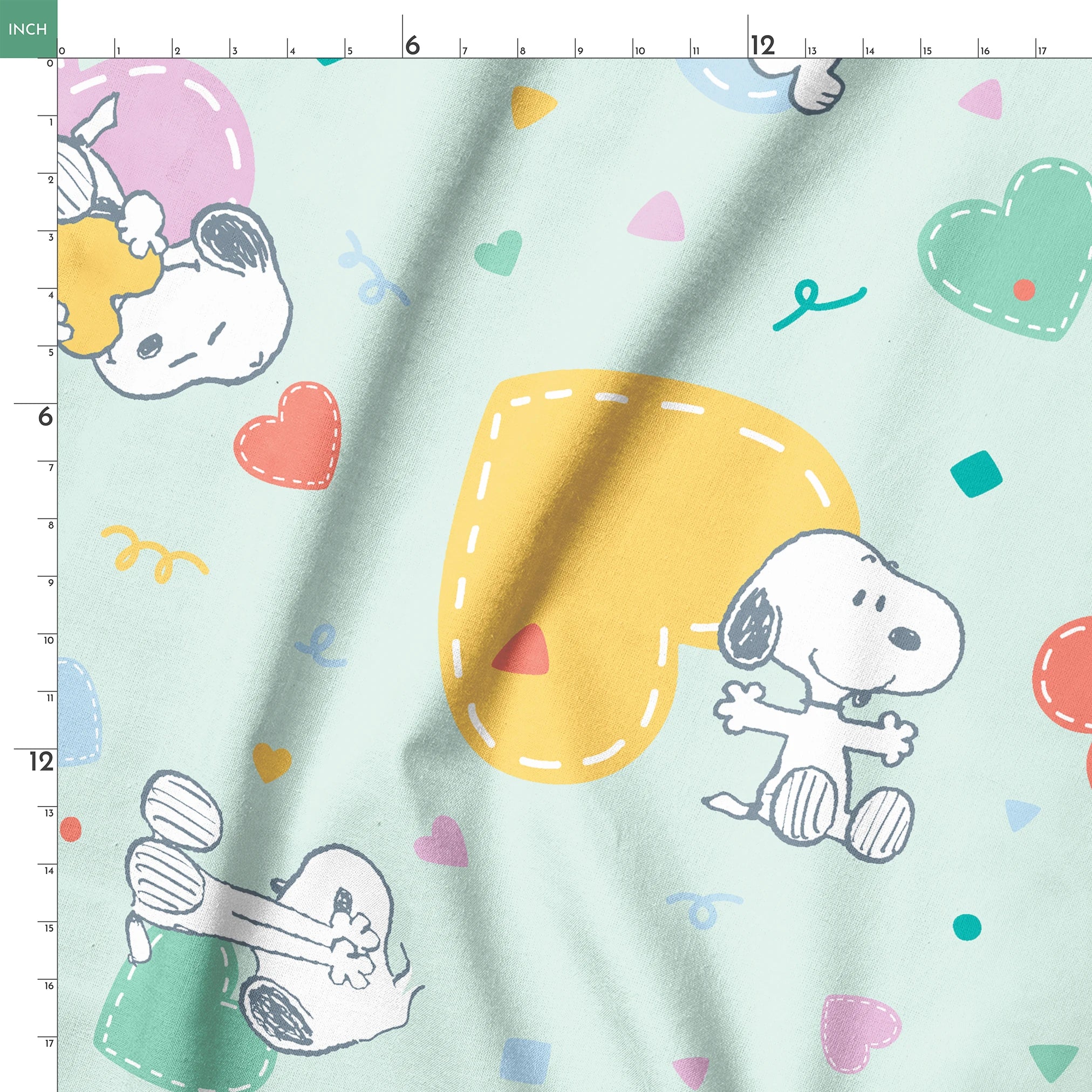 Cartoon Snoopy pattern with colorful hearts on mint green background, featuring different Snoopy poses springs ruler 18x18