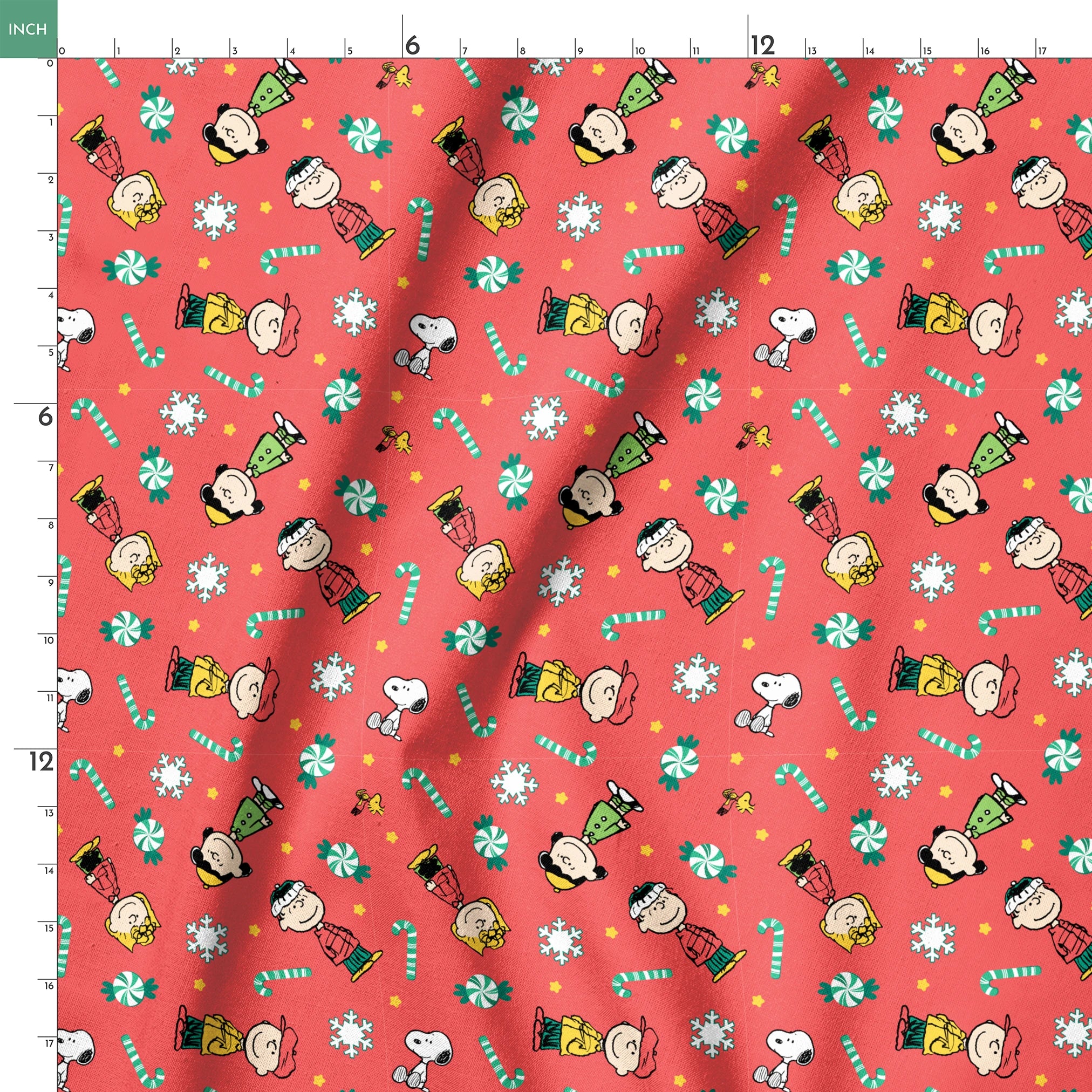 Festive Peanuts cartoon pattern with Charlie Brown characters, candy canes, snowflakes, and peppermints on red background springs ruler 18x18