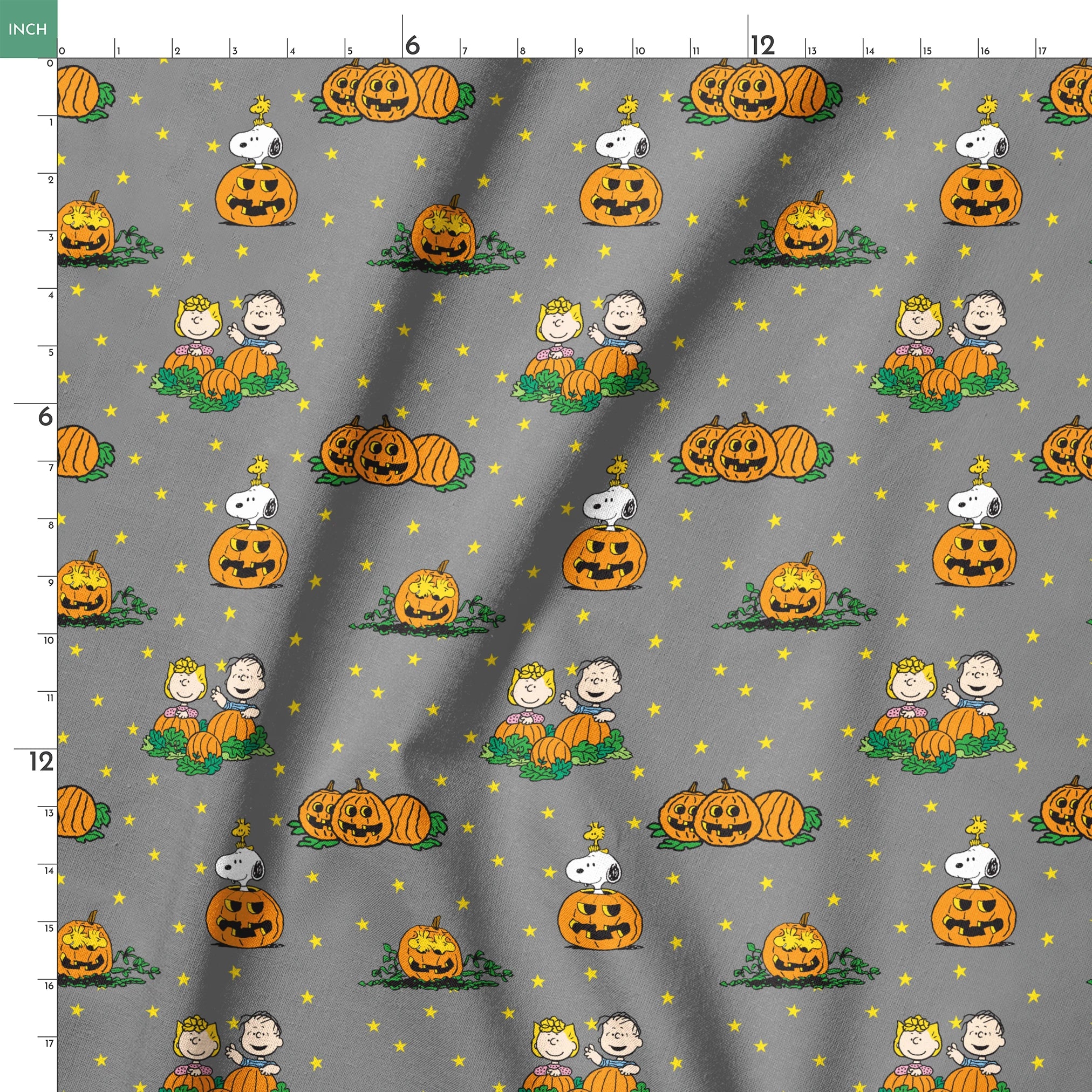 Peanuts Halloween pattern with Snoopy on pumpkins, Peanuts characters in pumpkin patches, and yellow stars on gray background. springs ruler 18x18