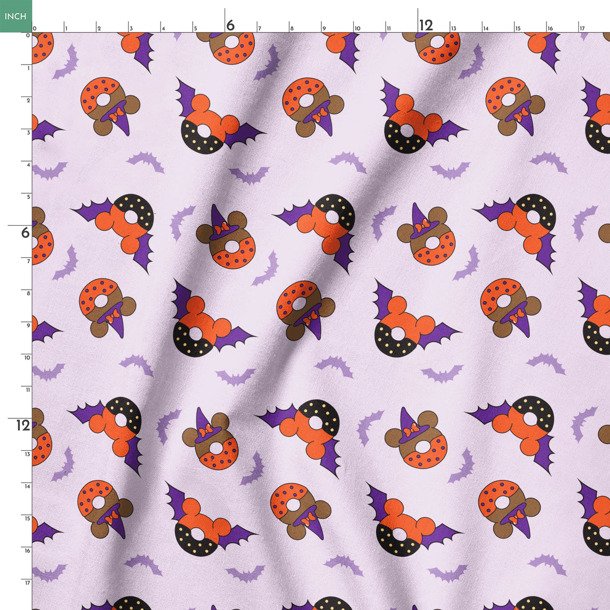 Disney Halloween-themed pattern with orange and black donuts, purple bat wings, and light purple bats on lavender background springs ruler 18x18