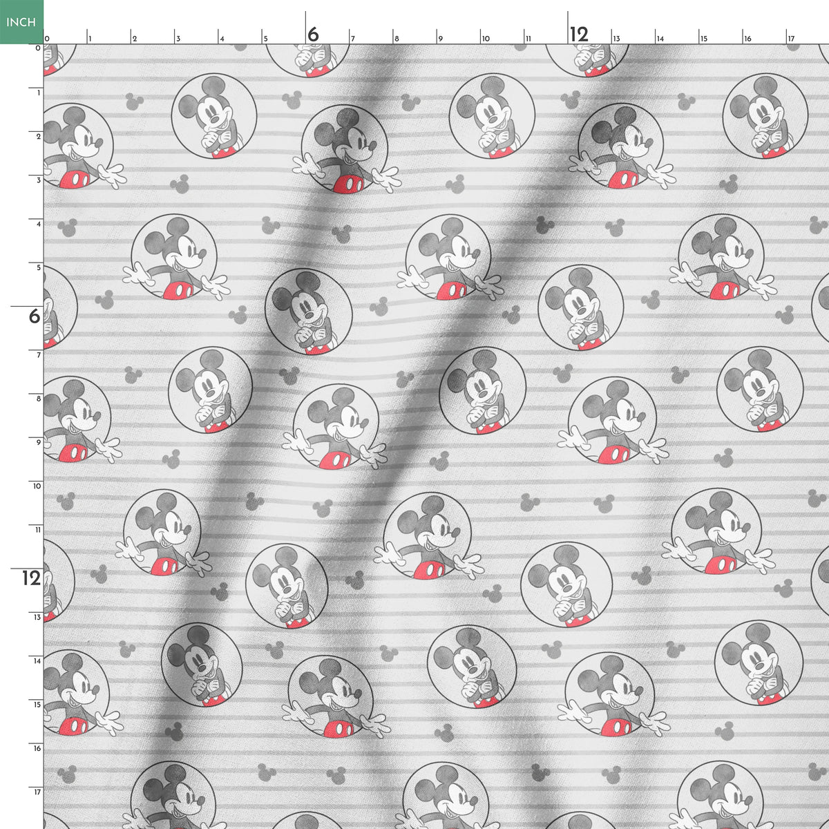 Mickey Mouse pattern on gray striped background with circular character portraits in red, black, and white springs ruler 18x18