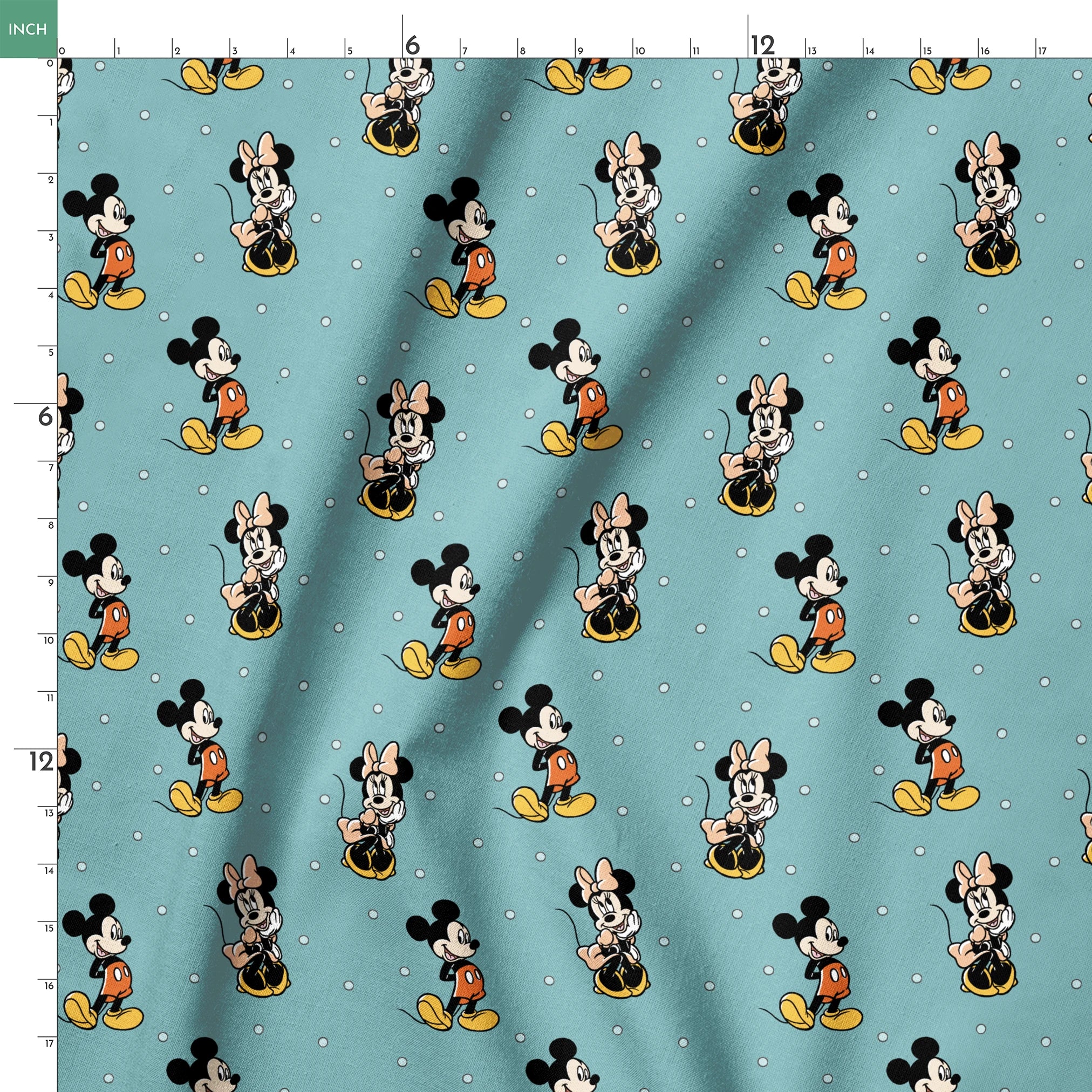 Cartoon pattern of Mickey and Minnie Mouse characters on light blue background with white dots springs ruler 18x18
