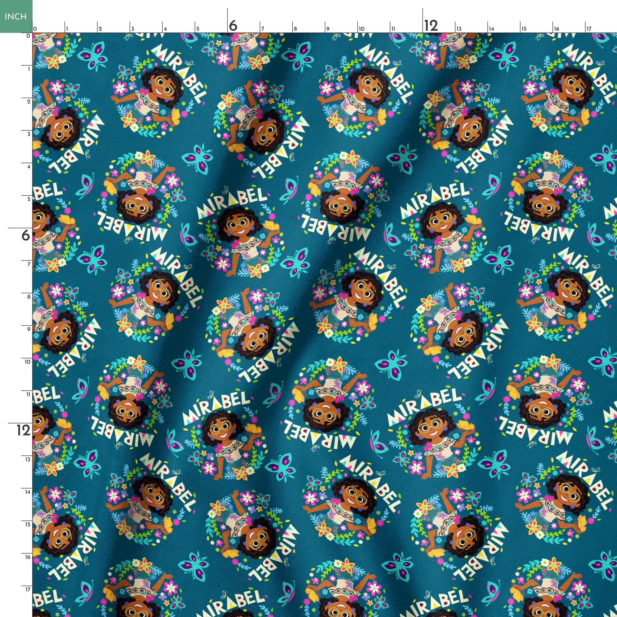 Colorful cartoon pattern on teal background featuring characters, butterflies, flowers, and "Mirabel" text in repeating design springs ruler 18x18