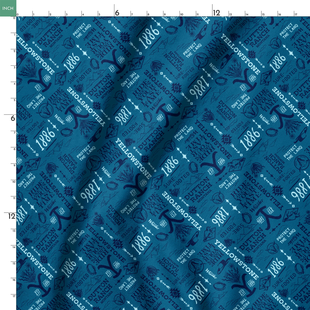 Paramount Yellowstone Verbiage Collage on Blue Fabric