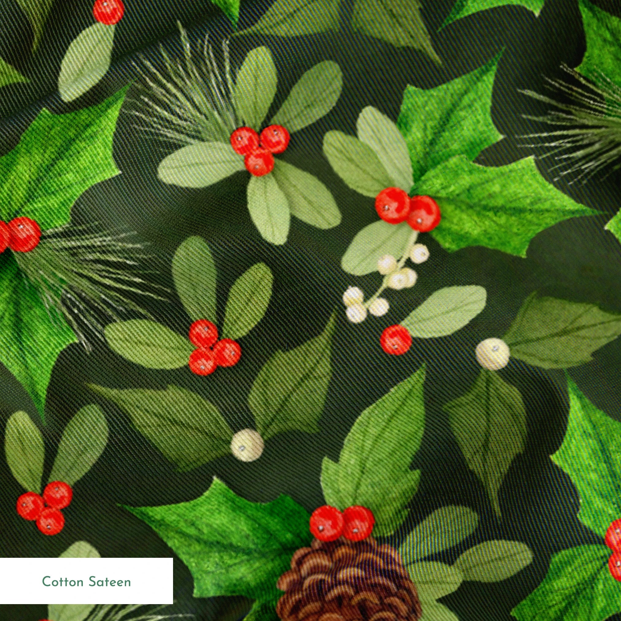 Seamless holiday pattern by Nicole Tamarin featuring pinecones, holly, red berries, and green foliage on a dark green background. springs sateen texture