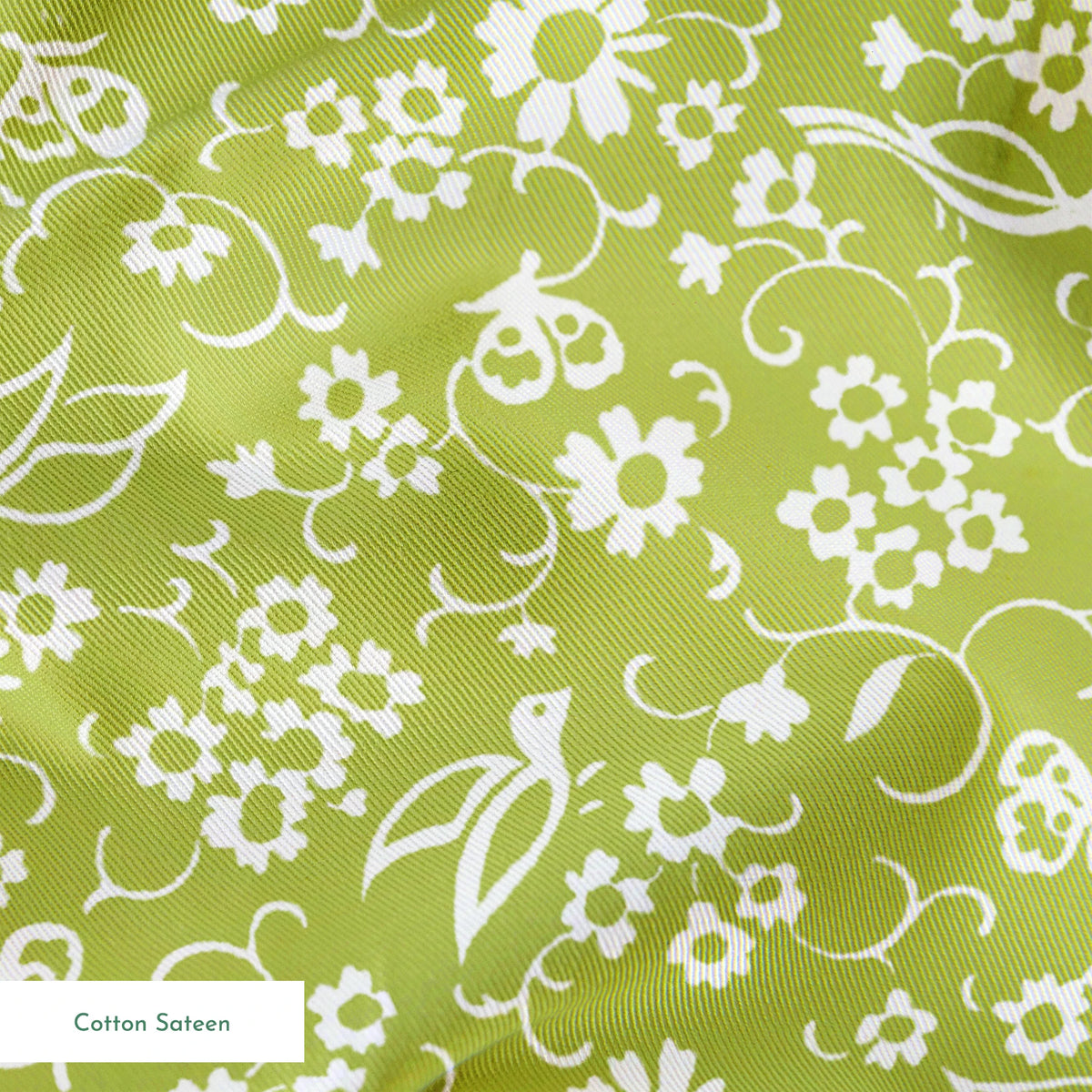 White bird and floral pattern on a vibrant lime green background. springs sateen texture