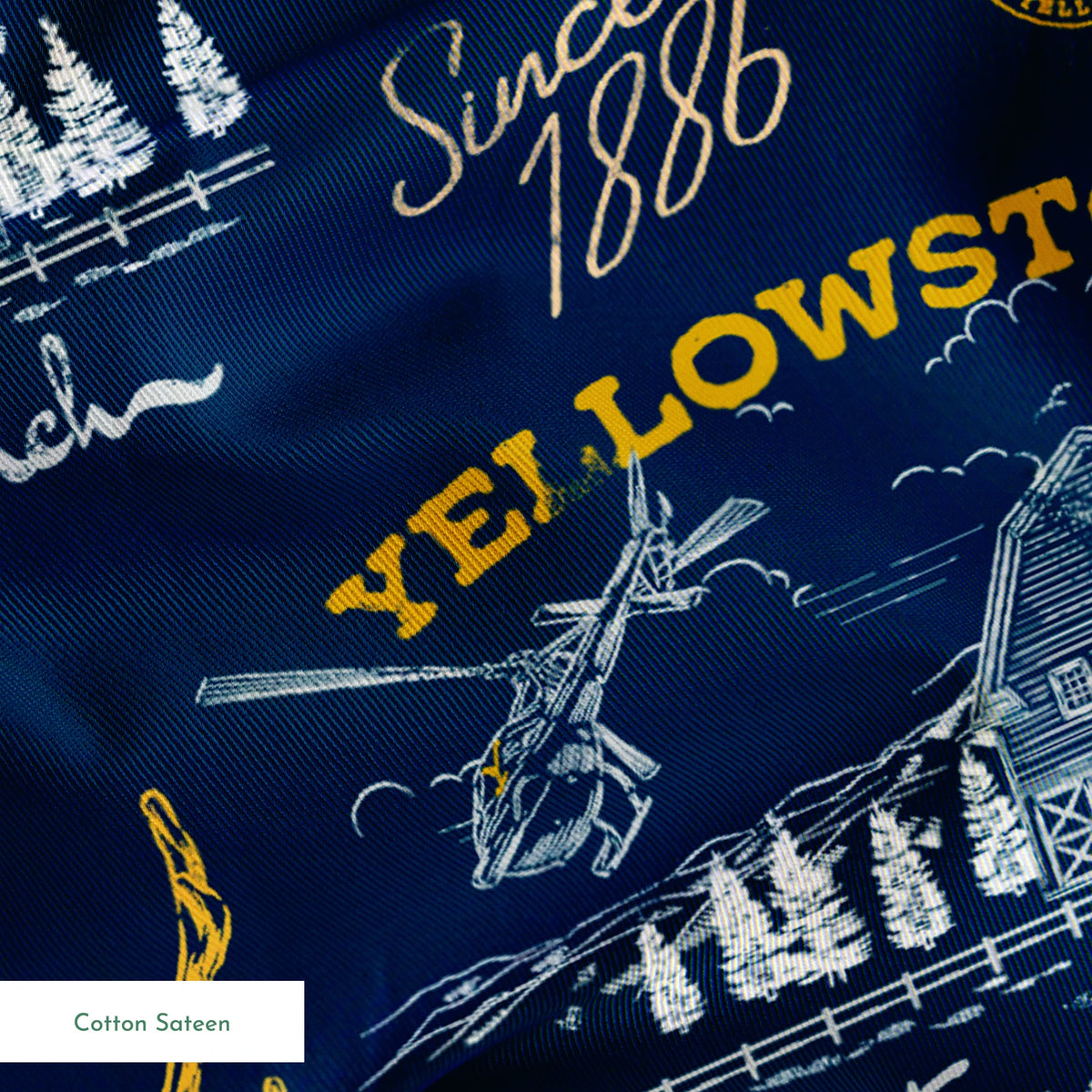 Yellowstone-themed pattern with Dutton Ranch logos, deer antlers, and "Y" branding on navy blue background springs sateen texture