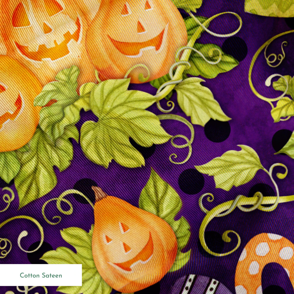 Halloween fabric by Nicole Tamarin with smiling jack-o’-lanterns, “BOO” text, vines, and leaves on a purple background. springs sateen texture