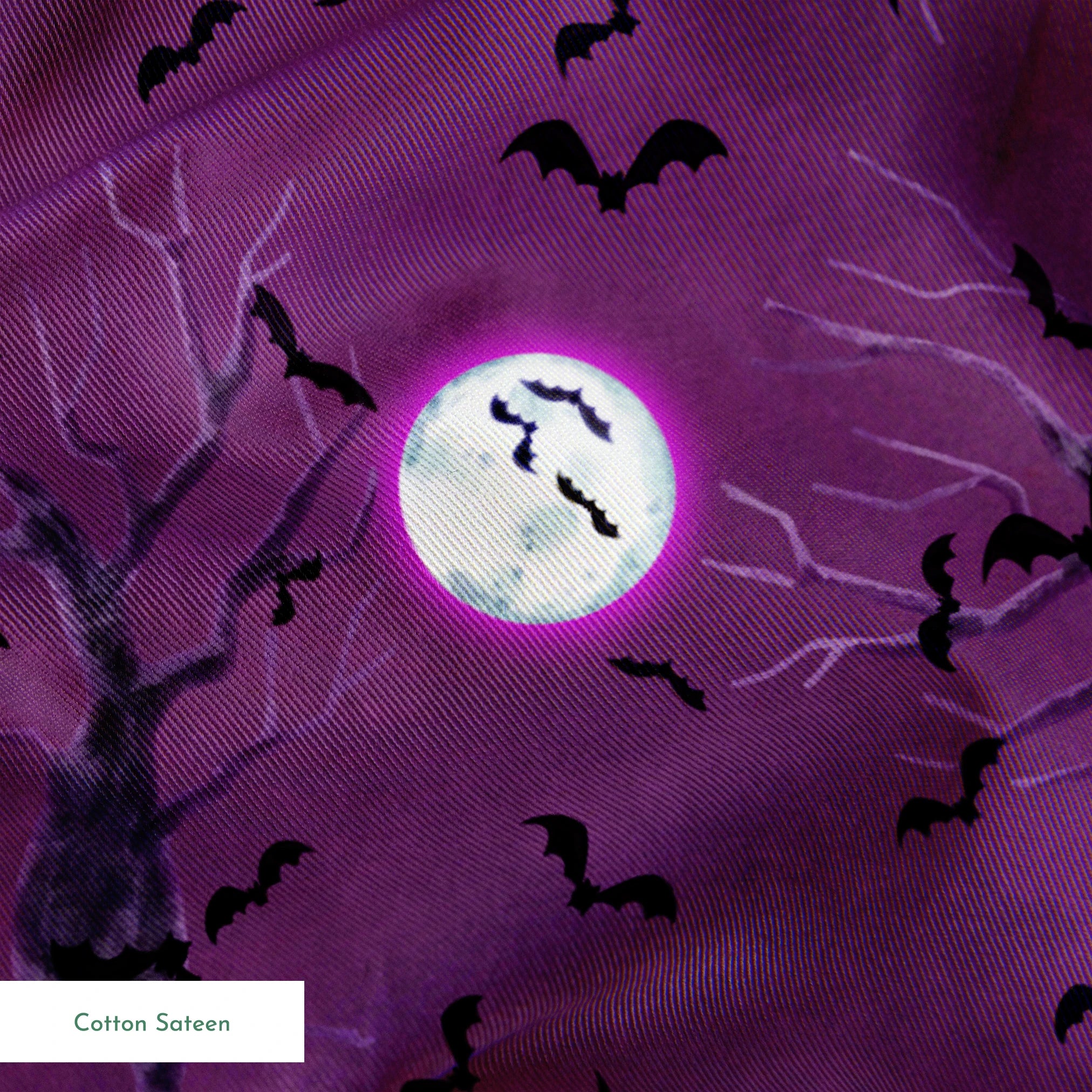 Halloween fabric design with spooky trees, bats, and glowing full moons on a purple background, illustrated by Nicole Tamarin. springs sateen texture