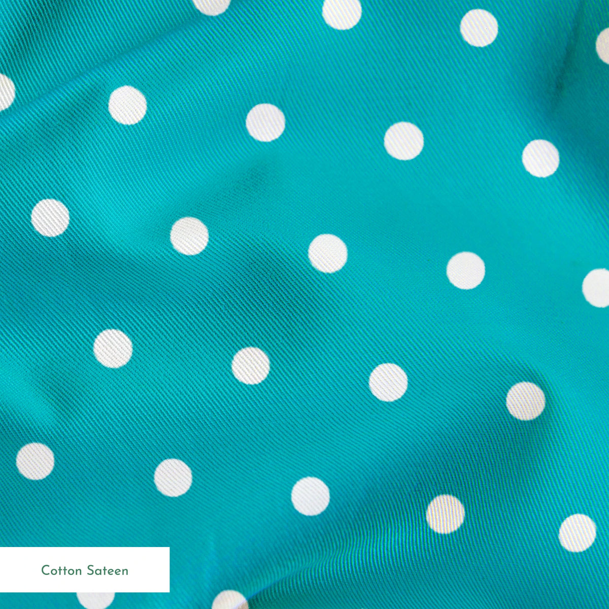 Two white circles on teal background springs sateen texture