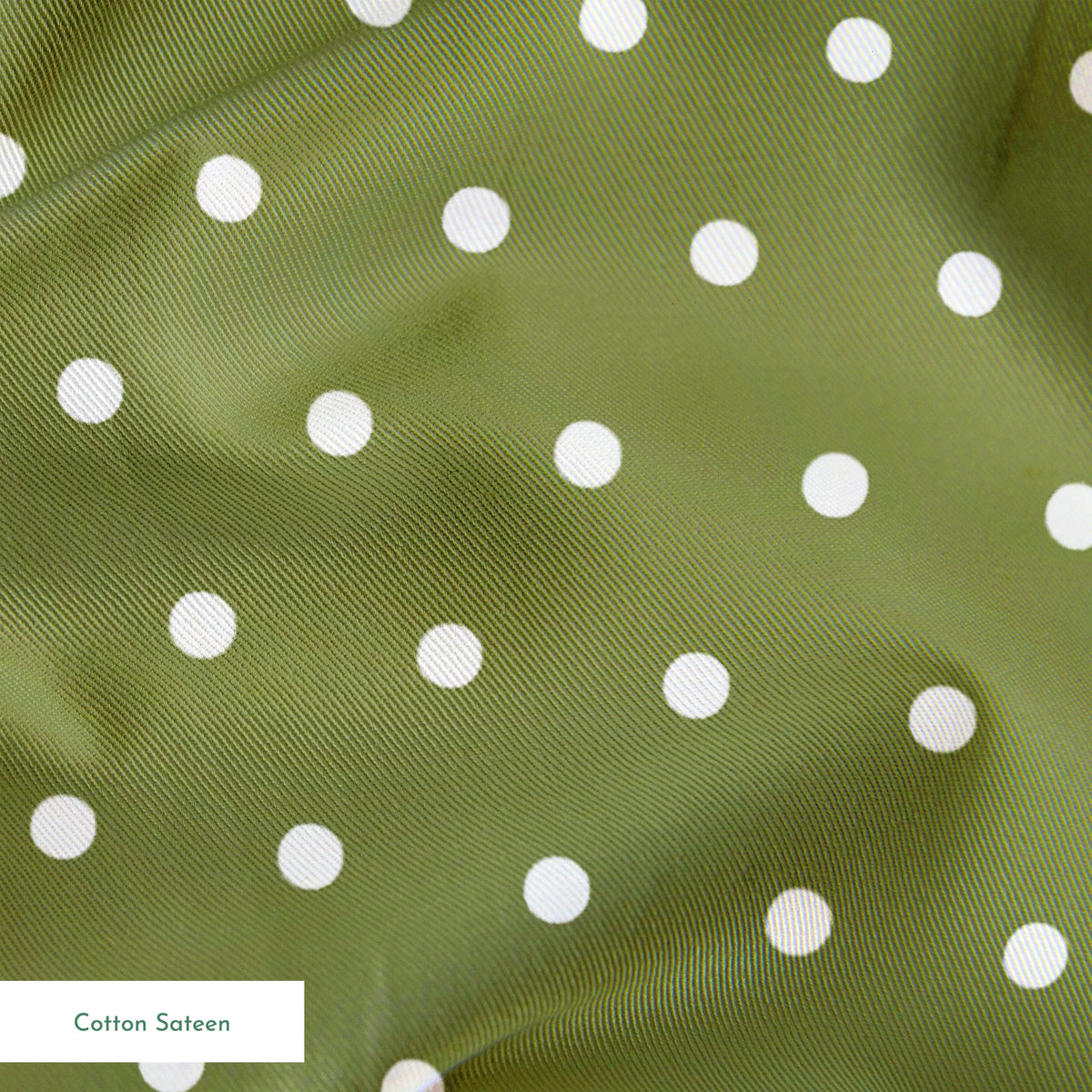 White circles on an olive green background springs sateen texture