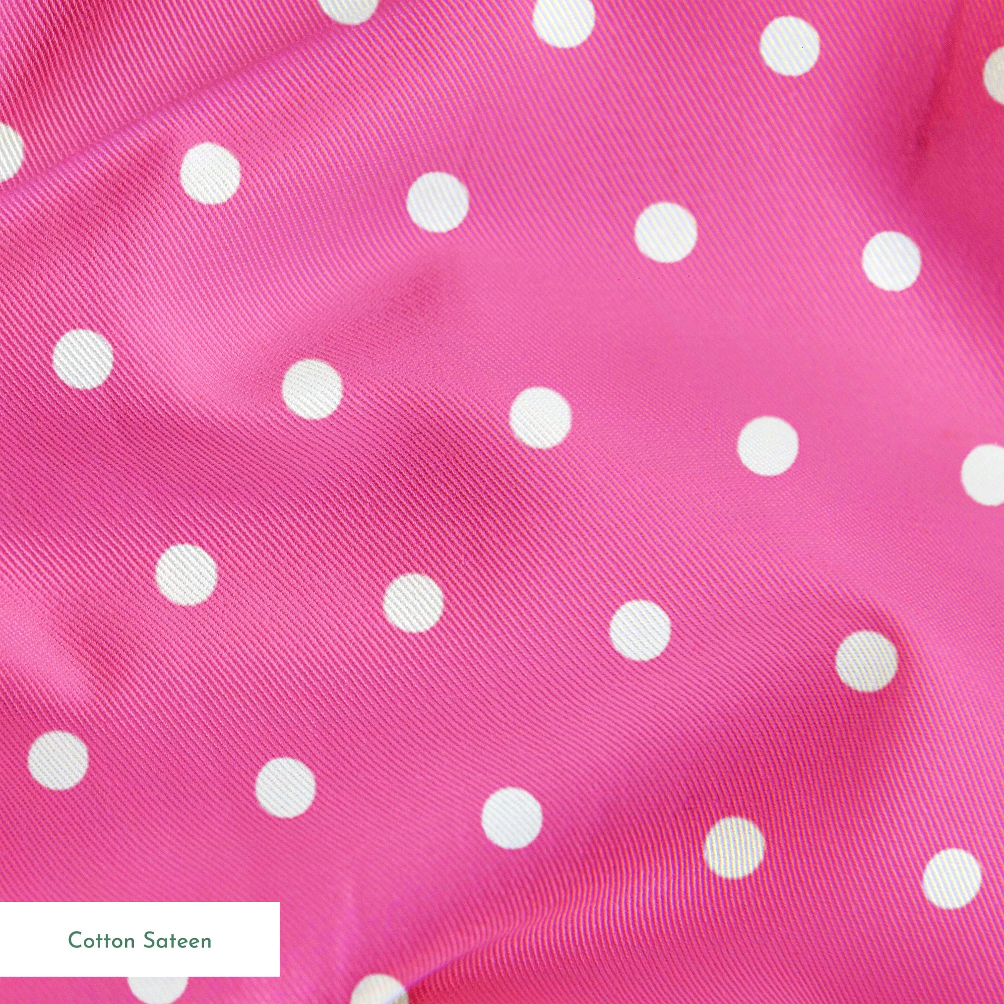 Two white circles on a bright pink background springs sateen texture