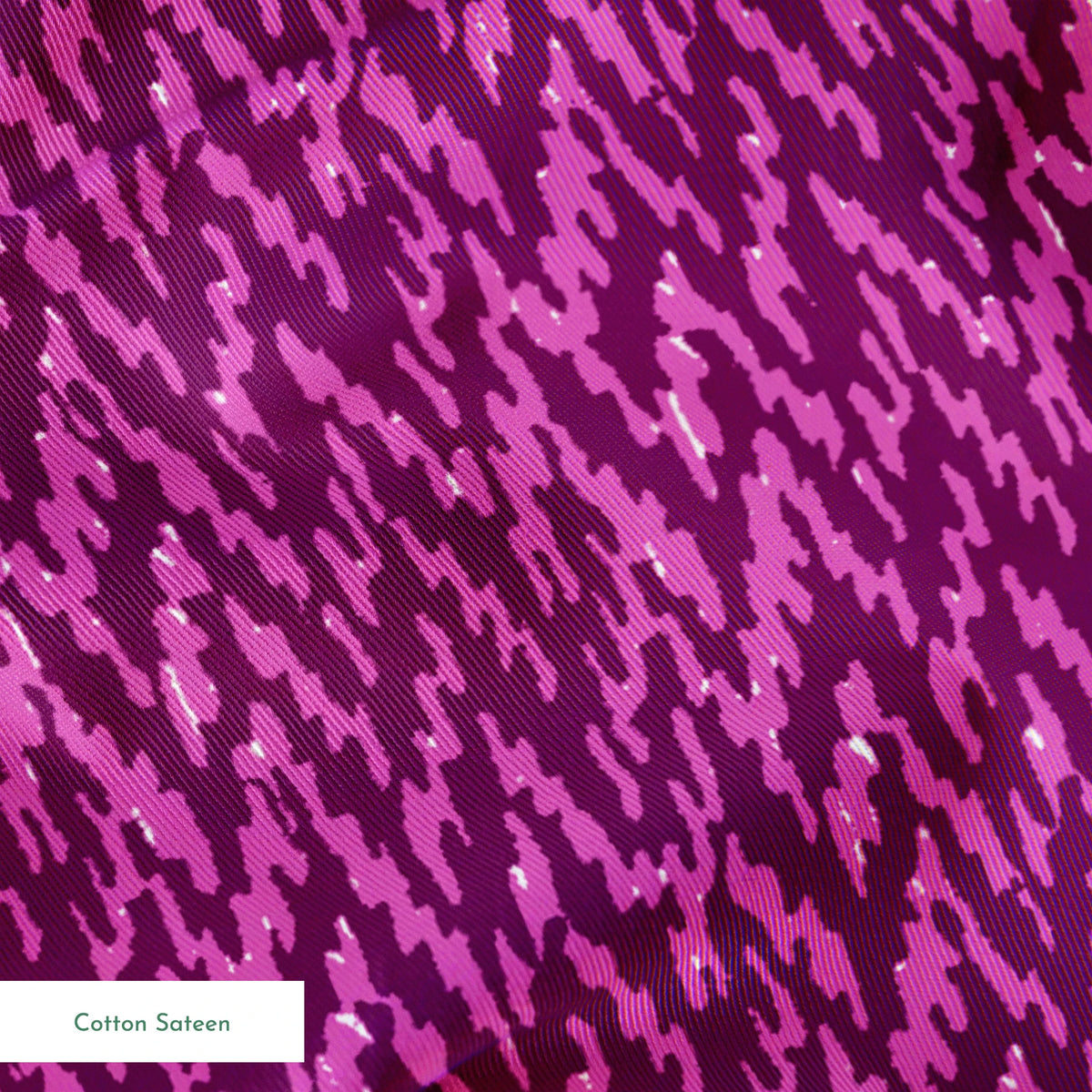 Purple abstract pattern with diagonal brush-like strokes in varying shades of magenta and violet springs sateen texture