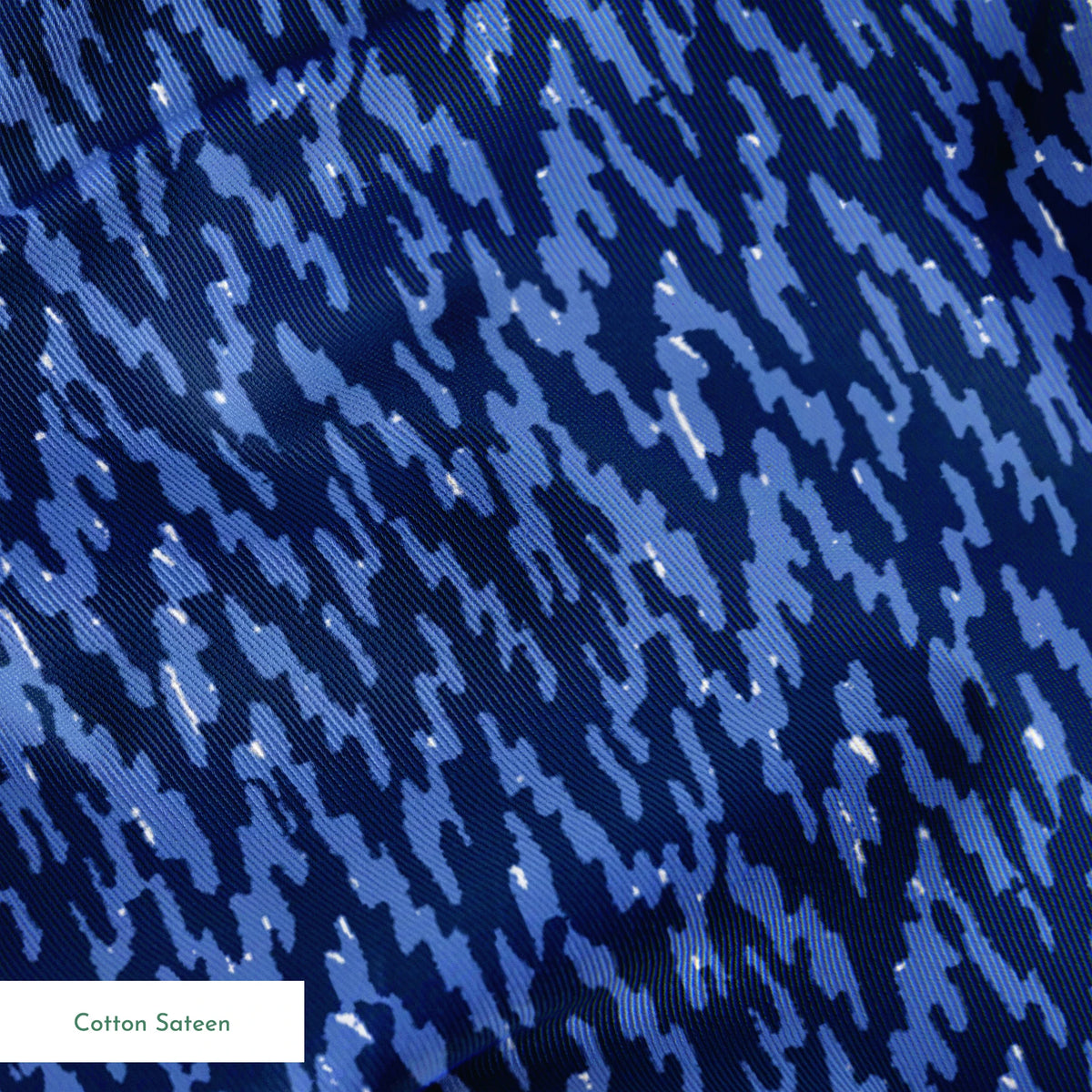 Abstract blue pattern with irregular vertical streaks in dark and light blue shades creating a textured, wavy appearance springs sateen texture
