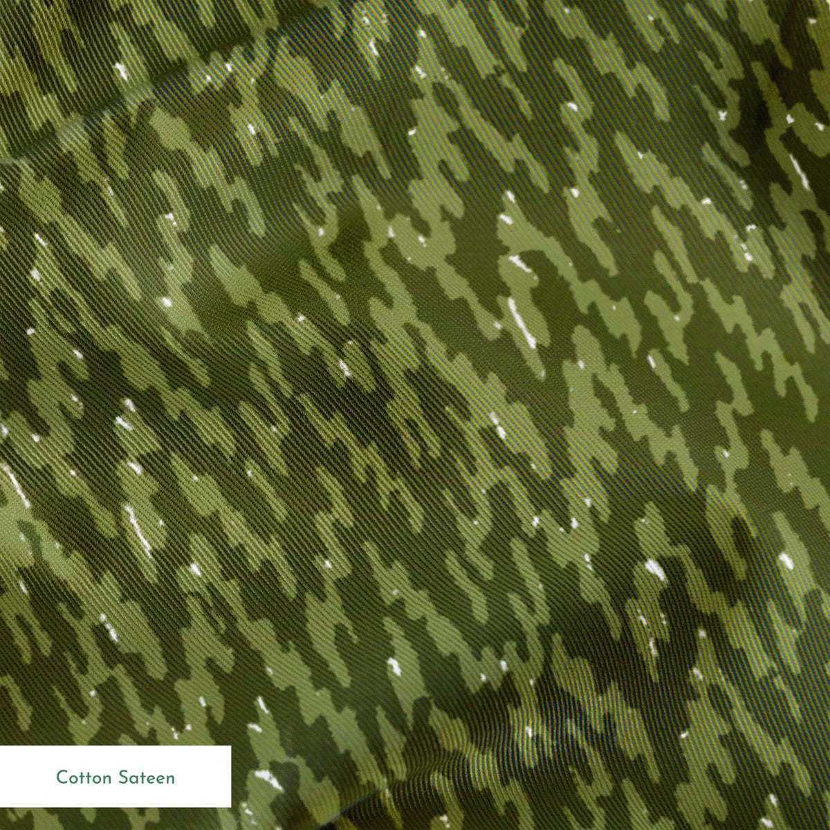 Military camouflage pattern in various shades of olive green with irregular vertical stripes springs sateen texture
