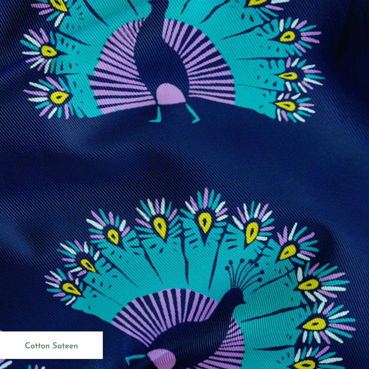 Vibrant peacock-inspired pattern with teal and purple fan shapes on blue background springs sateen texture