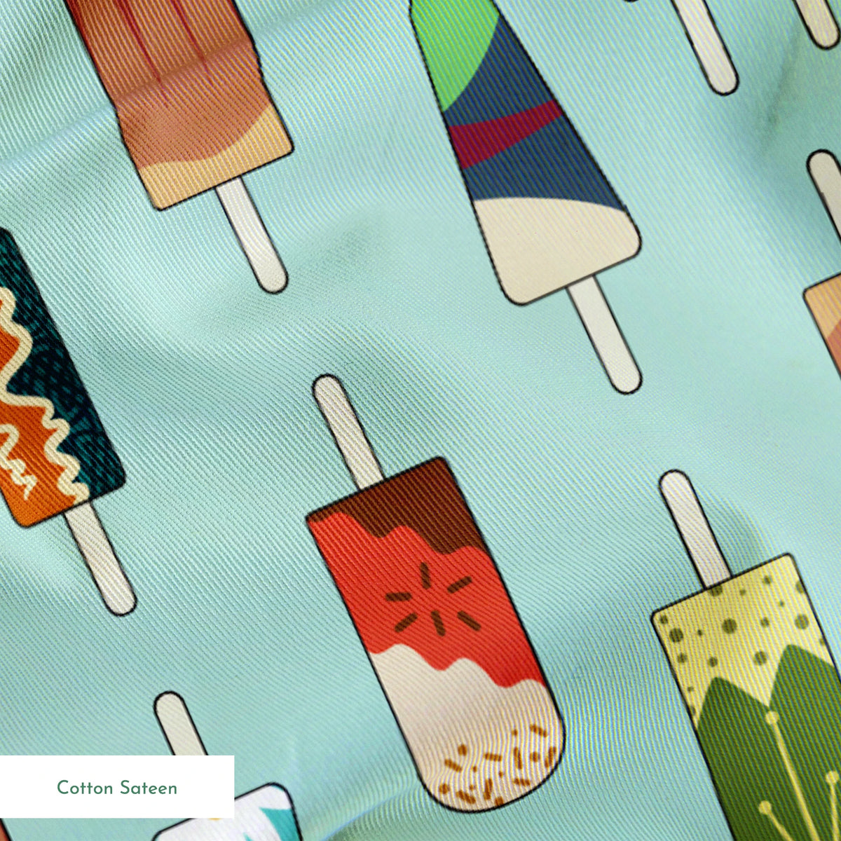 Disney Princess popsicle pattern on light teal background with various ice cream designs and styles springs sateen texture