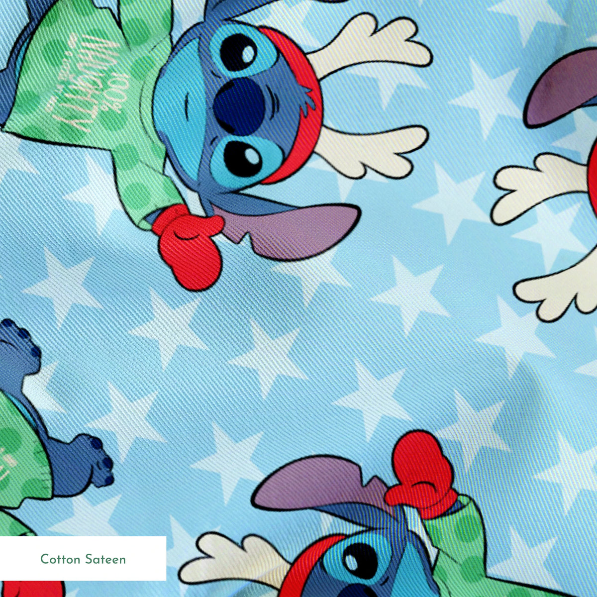 A repeating pattern of Disney's Stitch in holiday outfits with Christmas trees on light blue snowflake background. springs sateen texture