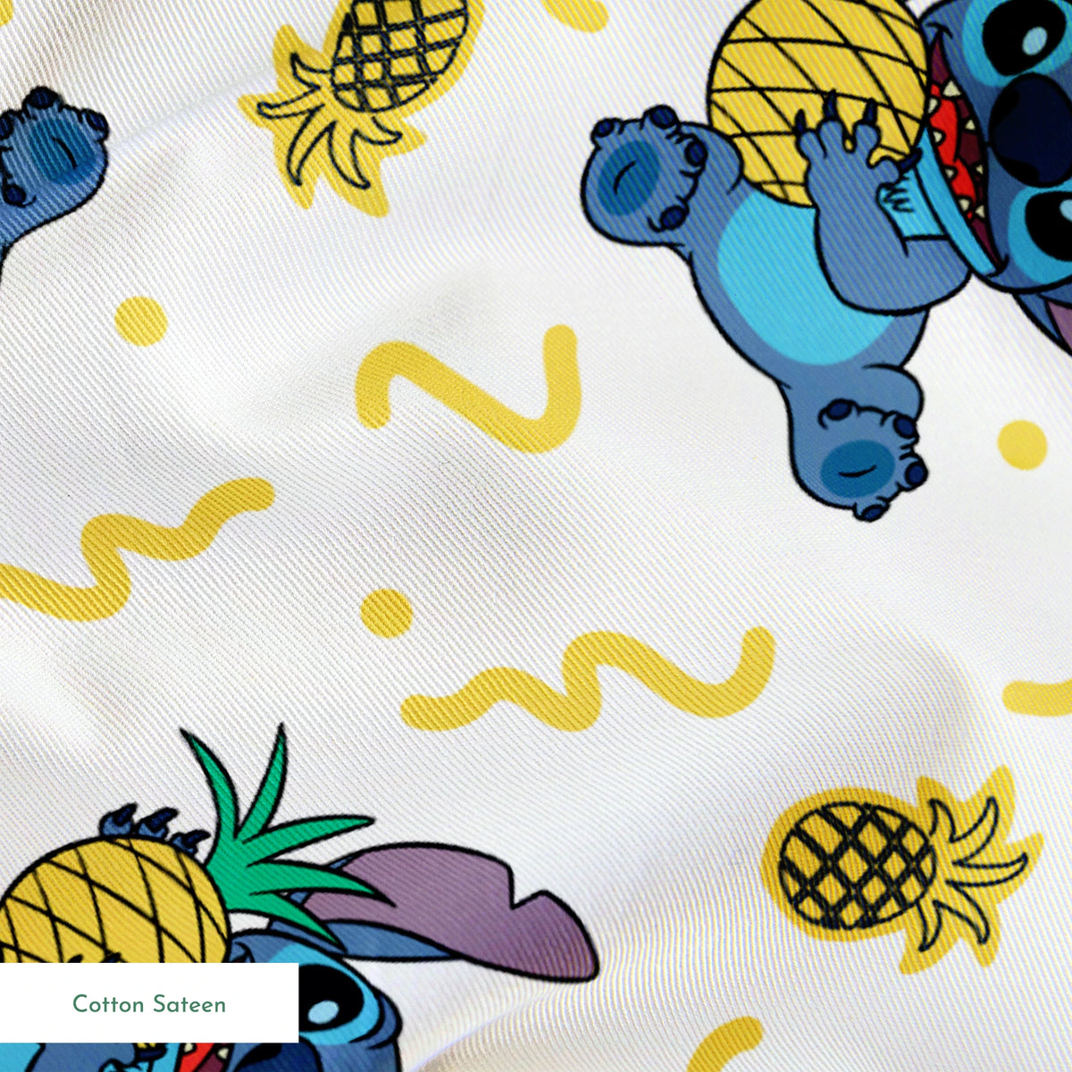 Disney's Stitch holding pineapples with yellow squiggly lines on white background pattern springs sateen texture