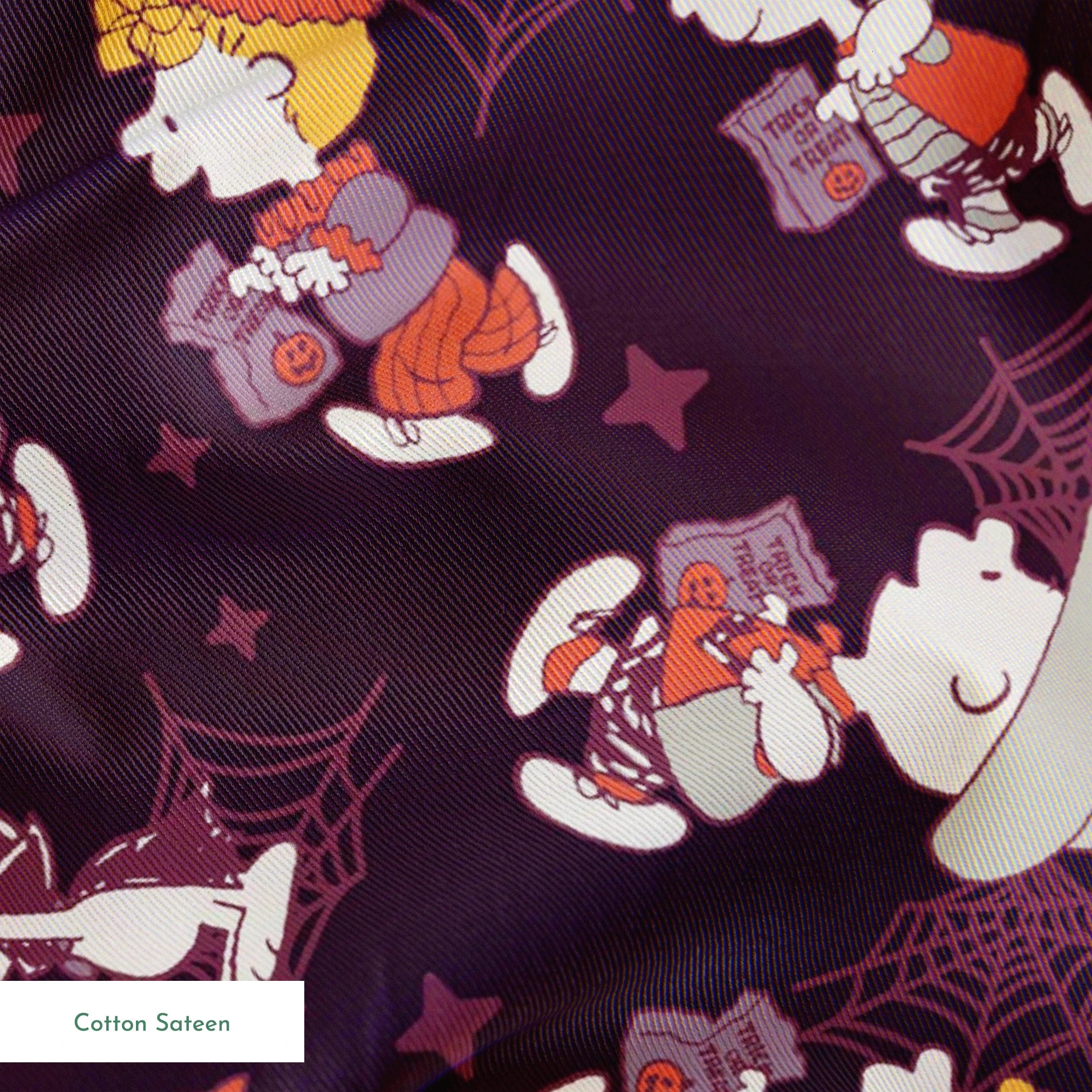 Snoopy and Peanuts characters in Halloween costumes scattered on dark purple background springs sateen texture