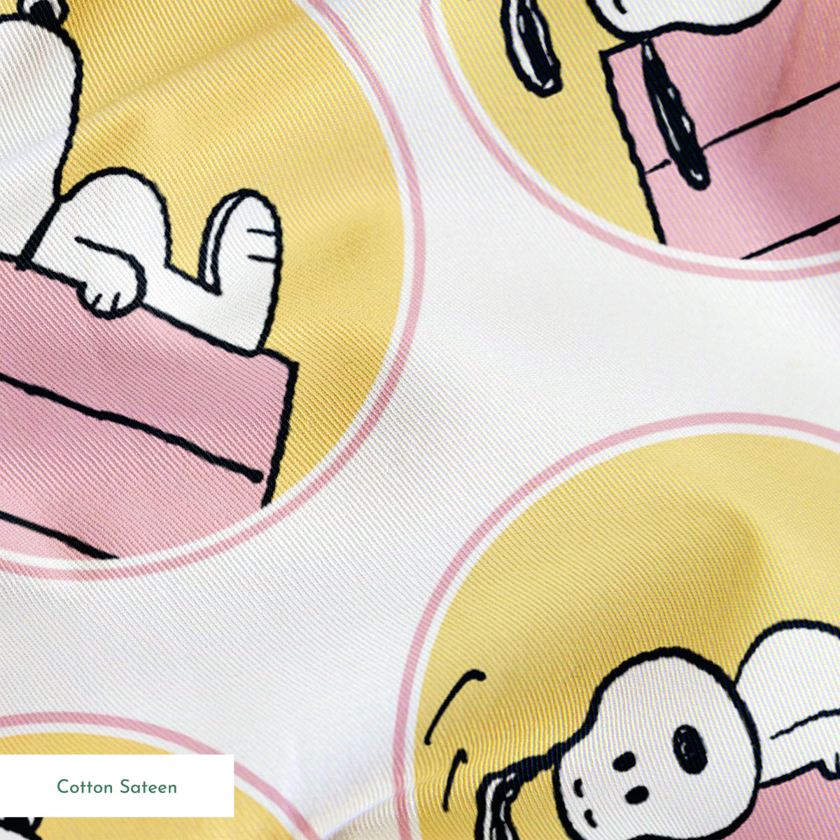 Snoopy lounging on pink doghouse roof in various poses, arranged in circular yellow frames springs sateen texture