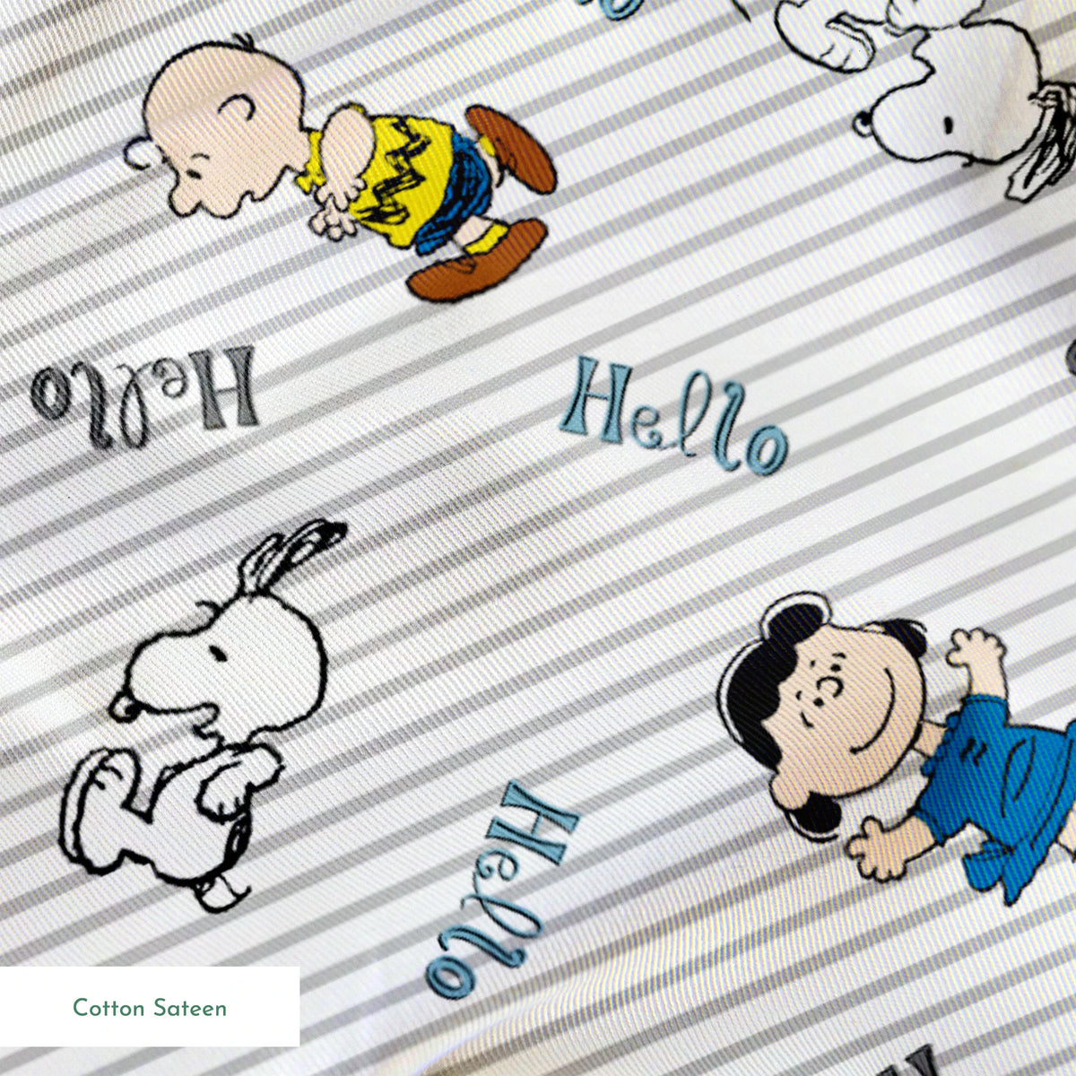 Peanuts cartoon characters scattered on striped background with "hello" text, featuring Snoopy, Charlie Brown, and friends springs sateen texture