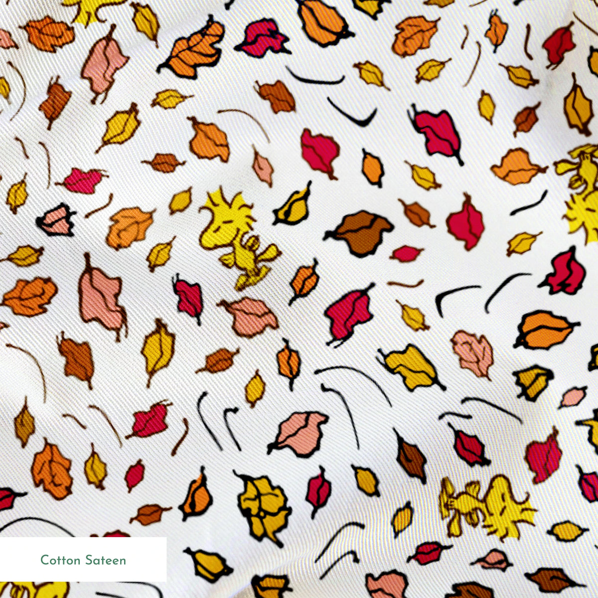Colorful Peanuts autumn leaves pattern with Woodstock and yellow, red, and brown foliage scattered on white background springs sateen texture