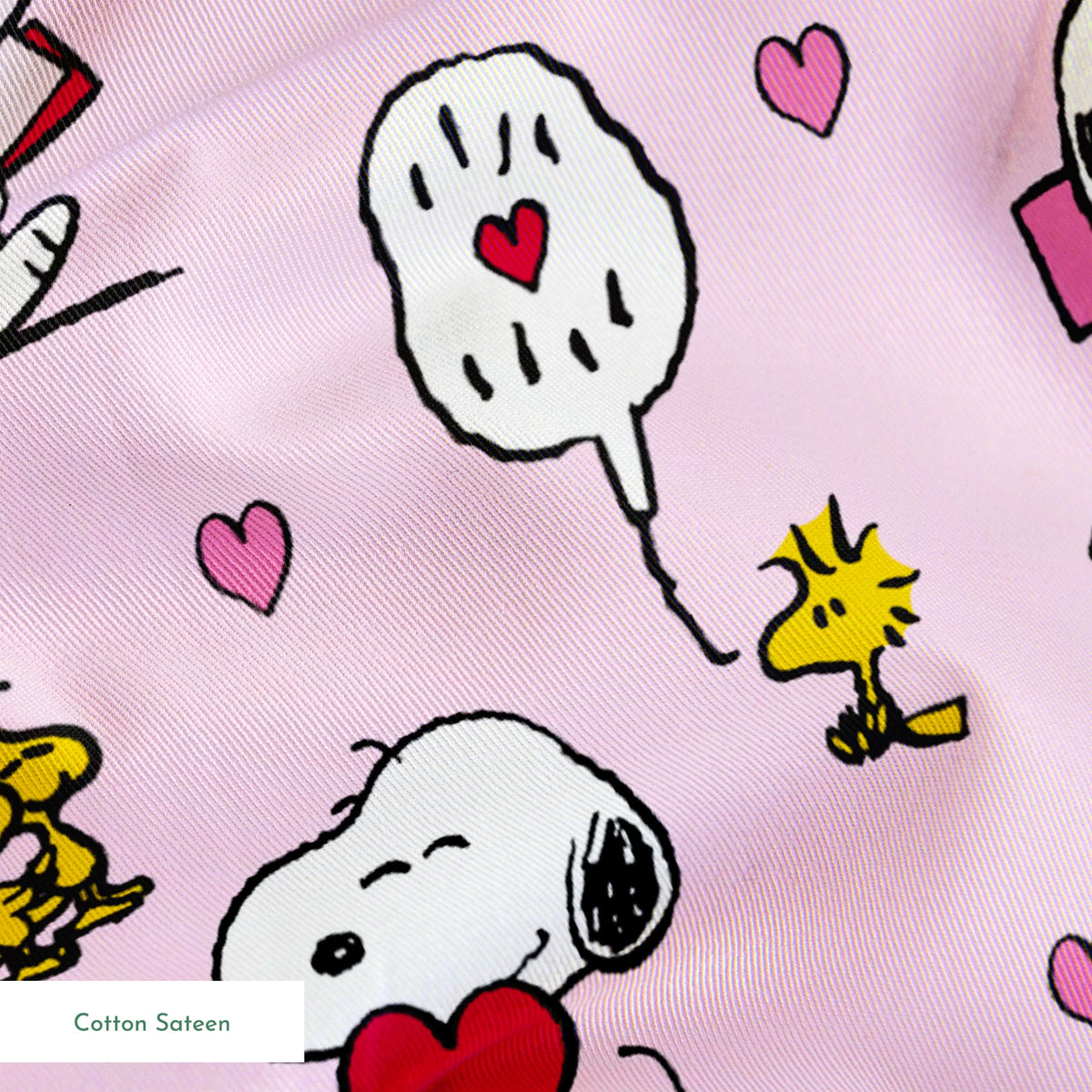 Valentine's pattern with Snoopy, Woodstock, and hearts on pink background, featuring love letters and speech bubbles. springs sateen texture