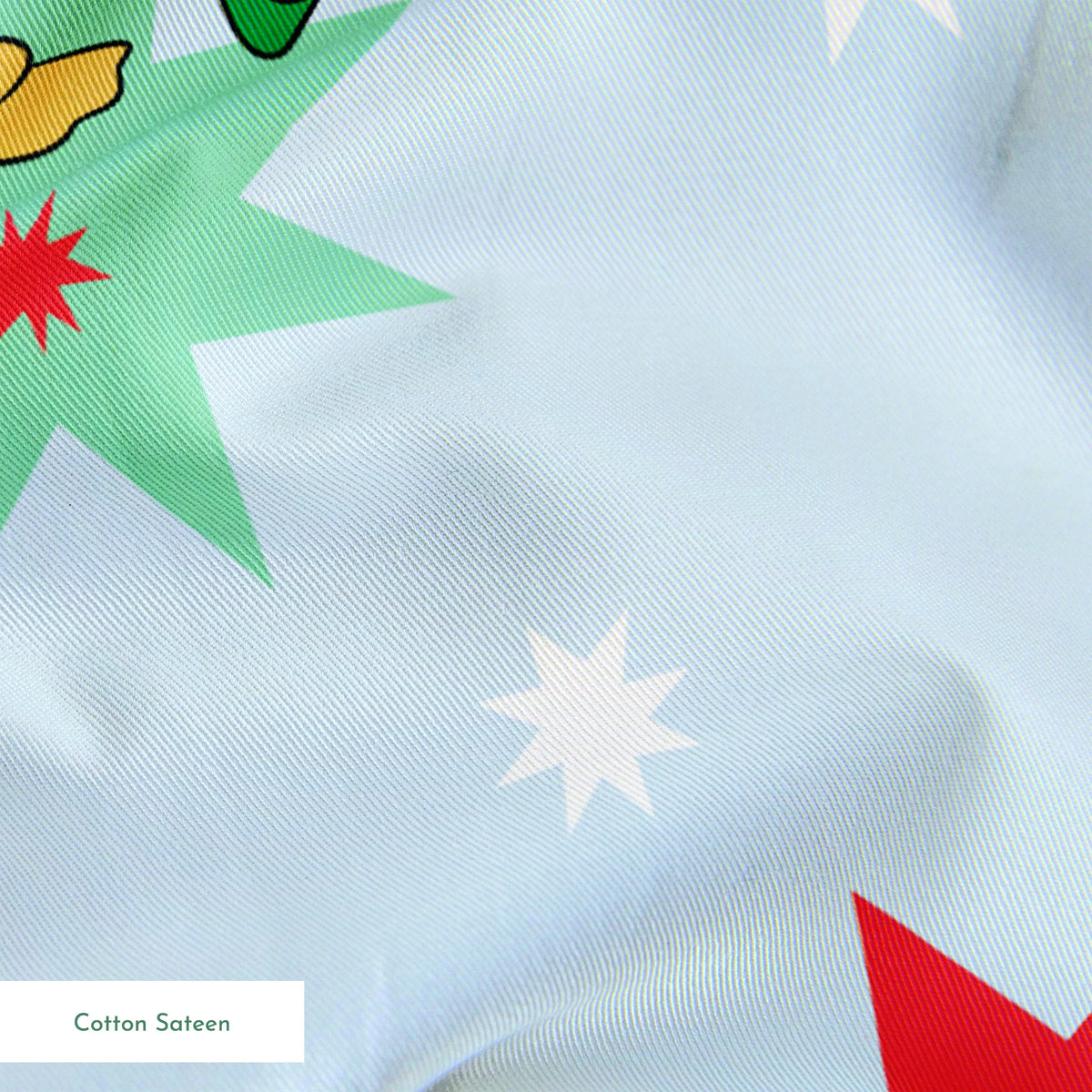 Cartoon Disney characters in festive poses with Christmas trees, ornaments, and stars on light blue snowy background springs sateen texture