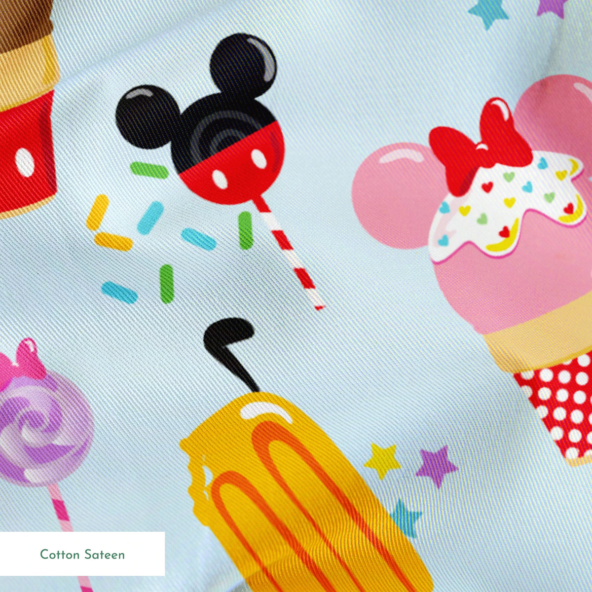 Disney-themed ice cream and sweet treats pattern with Mickey and Minnie icons on light blue background springs sateen texture