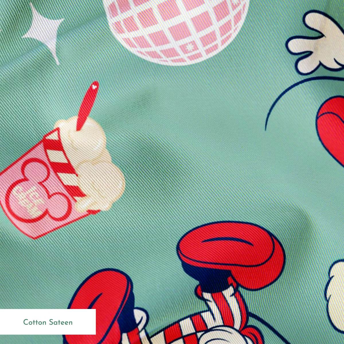 Mickey Mouse in red striped outfits with disco balls, pizza, popcorn, and snacks on mint green background. springs sateen texture