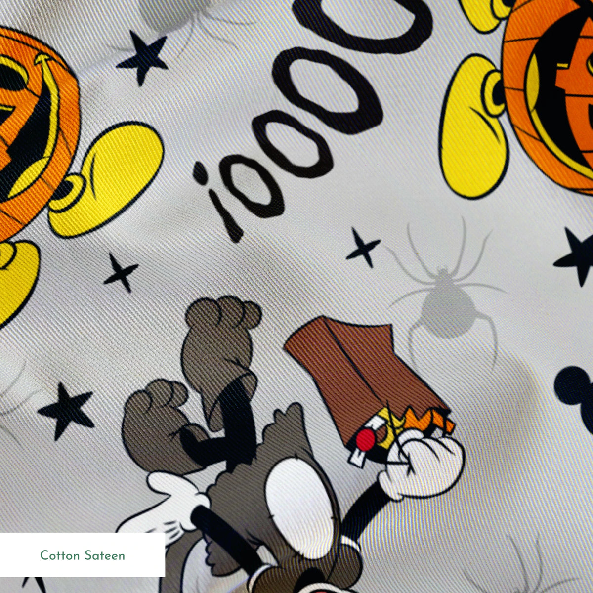 Mickey Mouse Halloween pattern with pumpkins, spiders, bats, "BOO!" text on gray background springs sateen texture