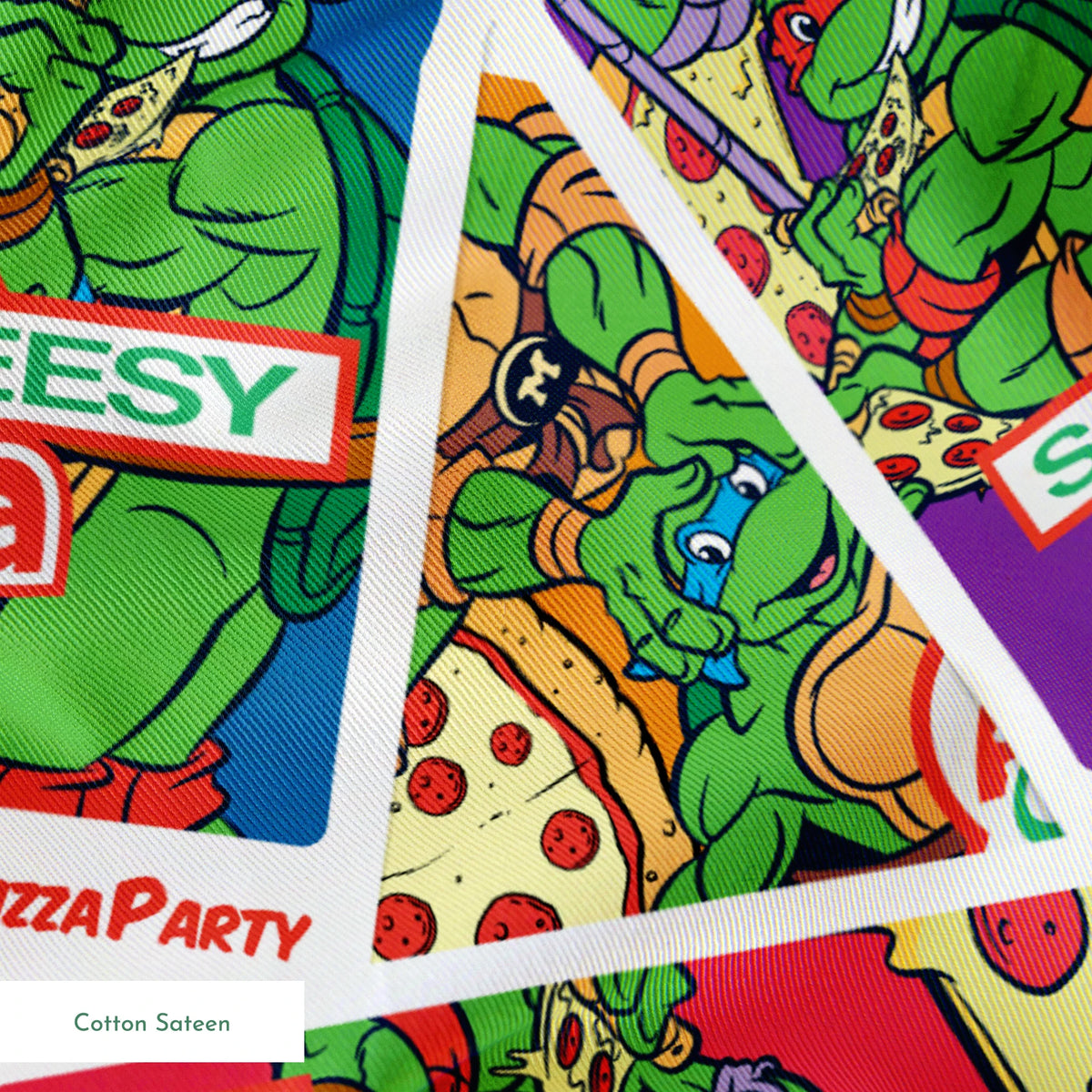 Scattered vintage Teenage Mutant Ninja Turtles trading cards with colorful comic-style artwork springs sateen texture