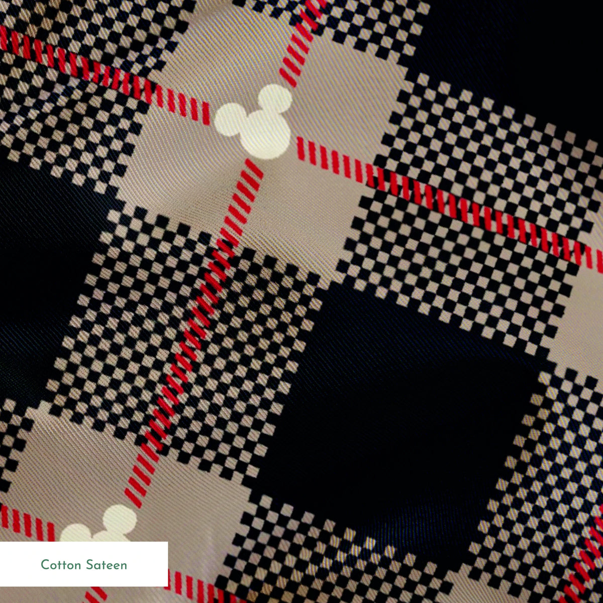 Diagonal plaid pattern with navy, beige, red stripes, checkered sections and small white circular details springs sateen texture