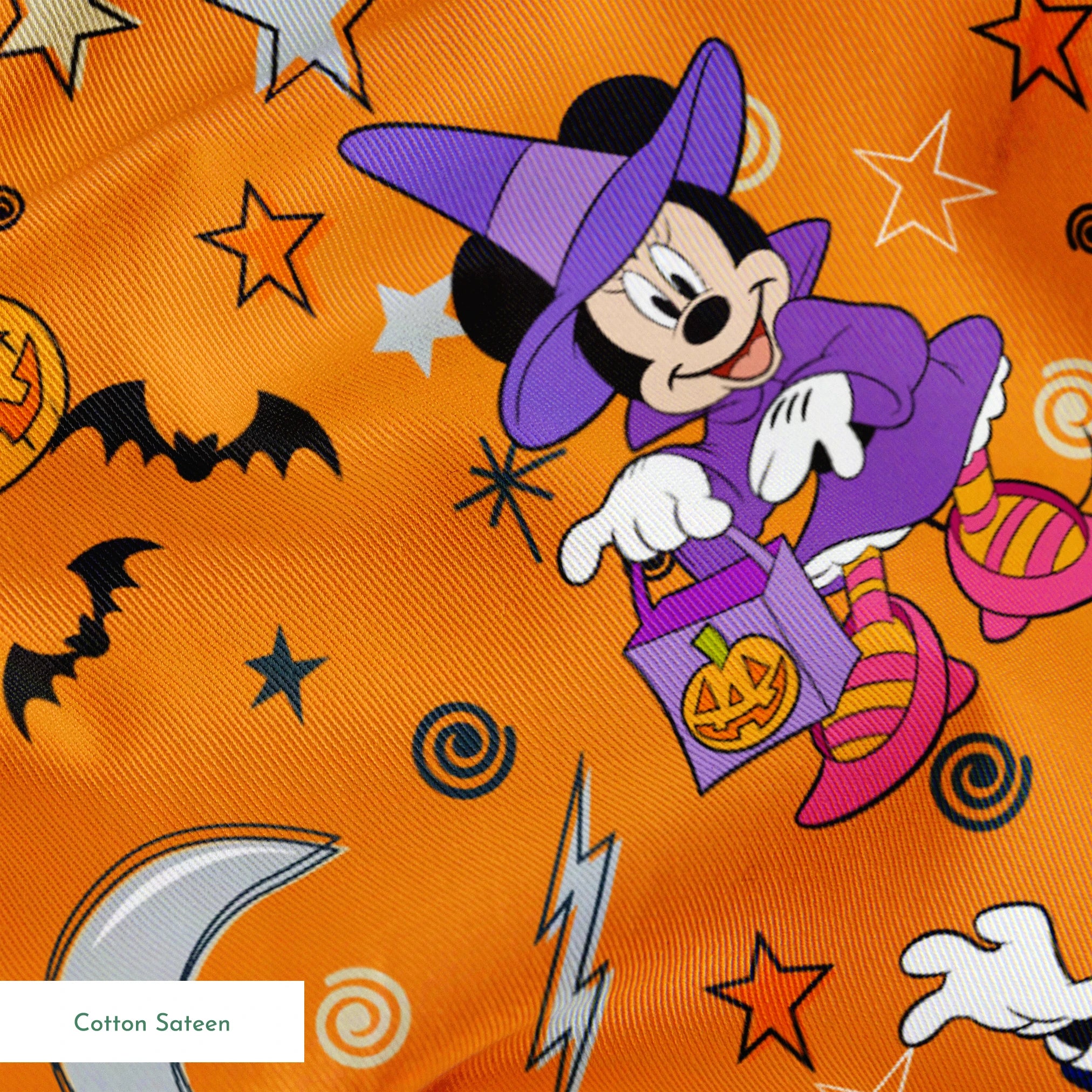 Halloween-themed cartoon pattern with Disney characters in costumes, bats, stars, moons, and ghosts on orange background. springs sateen texture