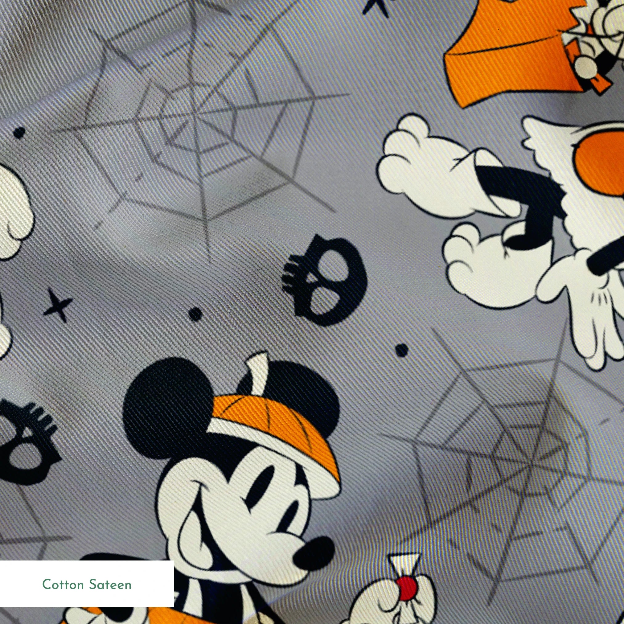 Cartoon dog characters in Halloween costumes with pumpkins on gray background with spider webs and skulls springs sateen texture
