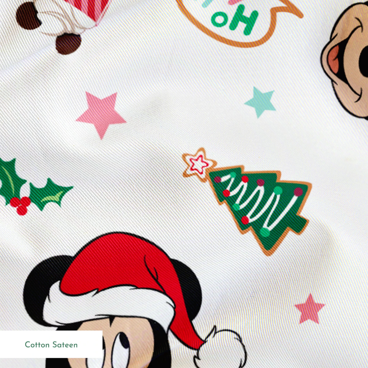 Mickey Mouse Christmas pattern with Santa hats, holly, speech bubbles, and festive decorations on white background springs sateen texture
