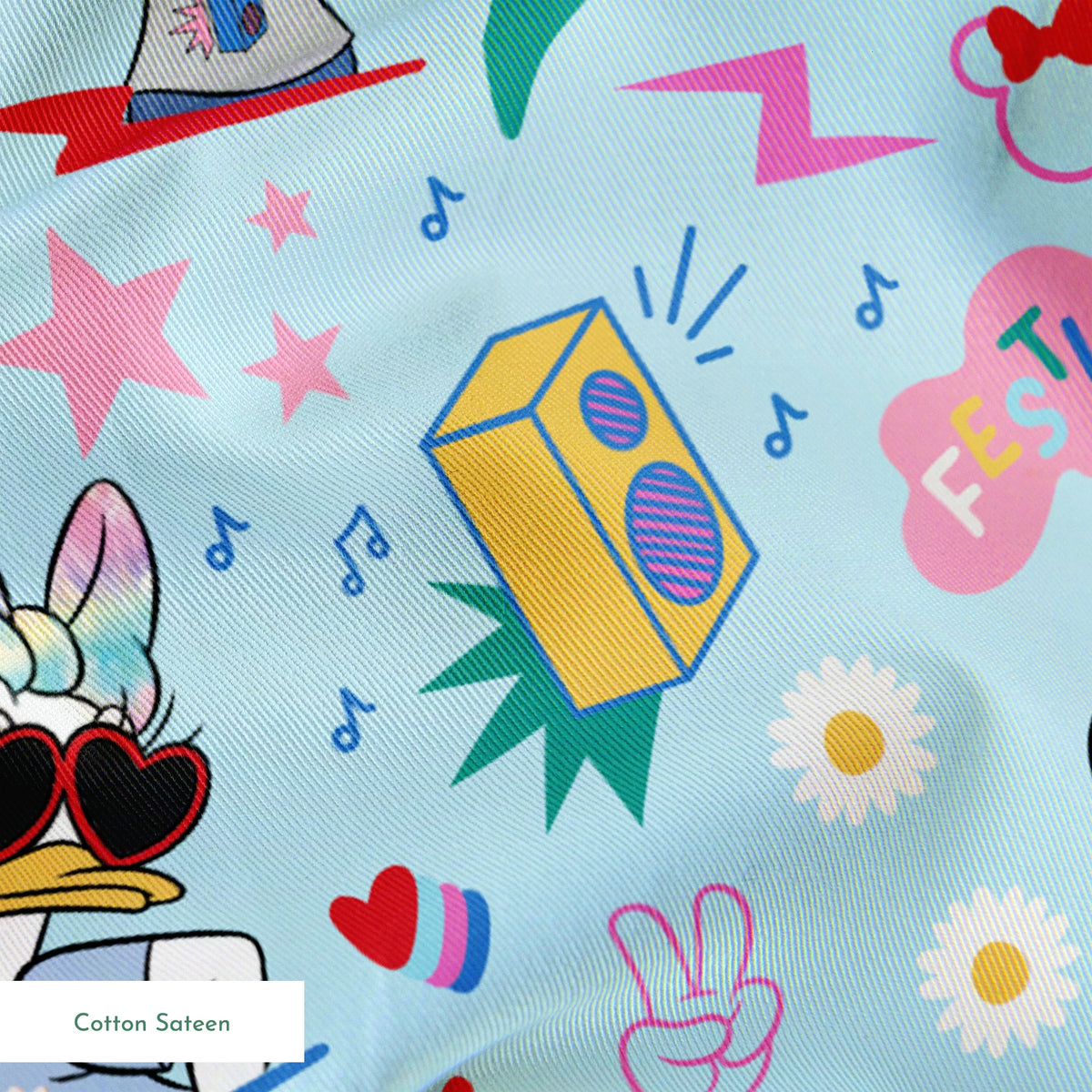 Colorful cartoon pattern with Disney characters, peace signs, stars, and music motifs on light blue background. springs sateen texture