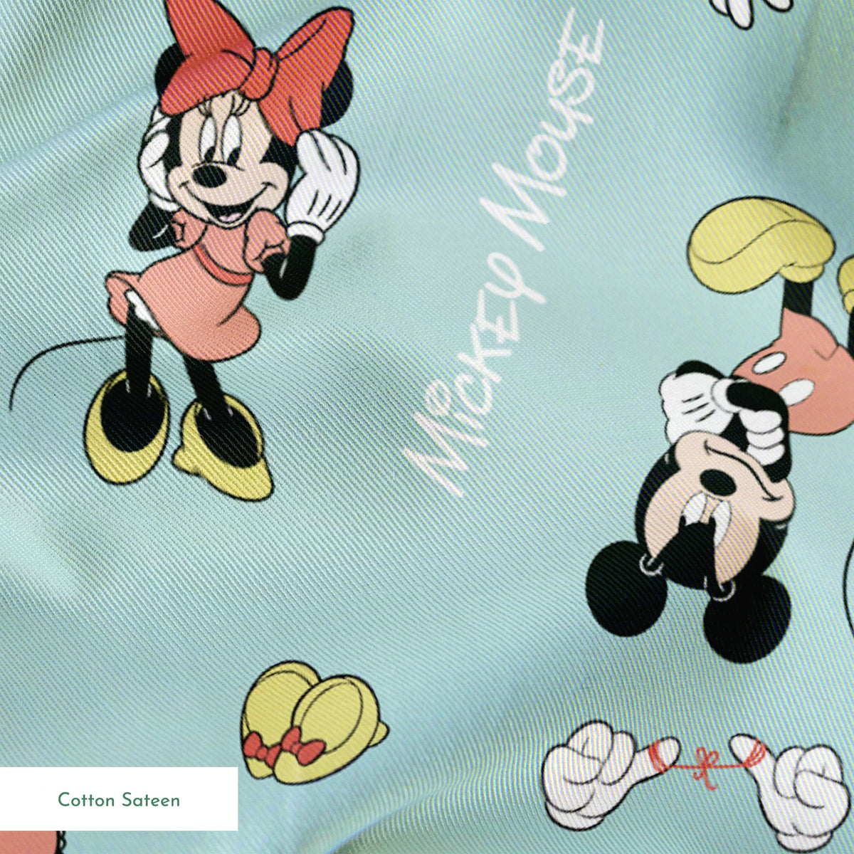 Mickey and Minnie Mouse pattern on light turquoise background with scattered characters, bows, and gloves springs sateen texture