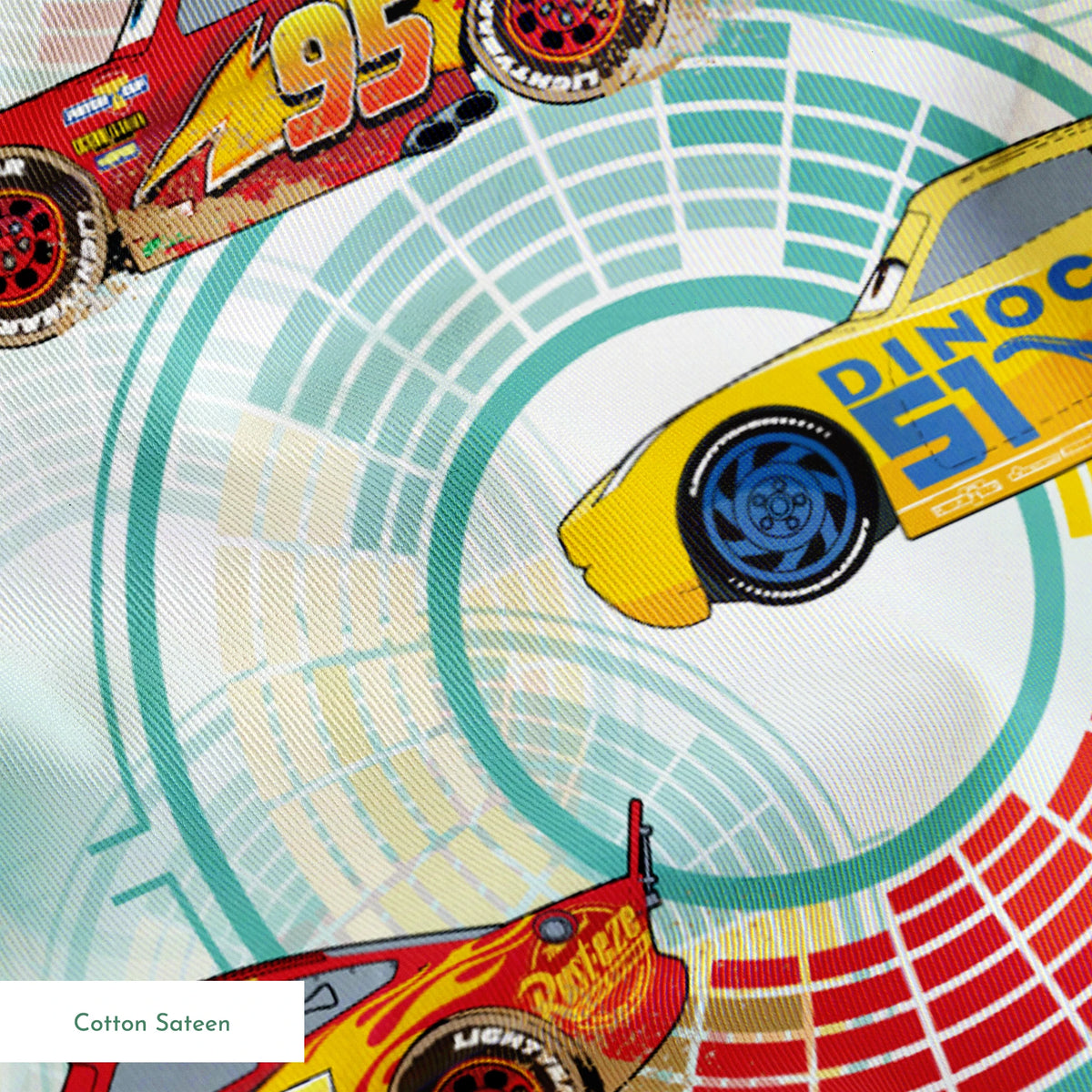 Colorful Disney Pixar Cars racing in red and yellow on a light blue background with circular patterns springs sateen texture