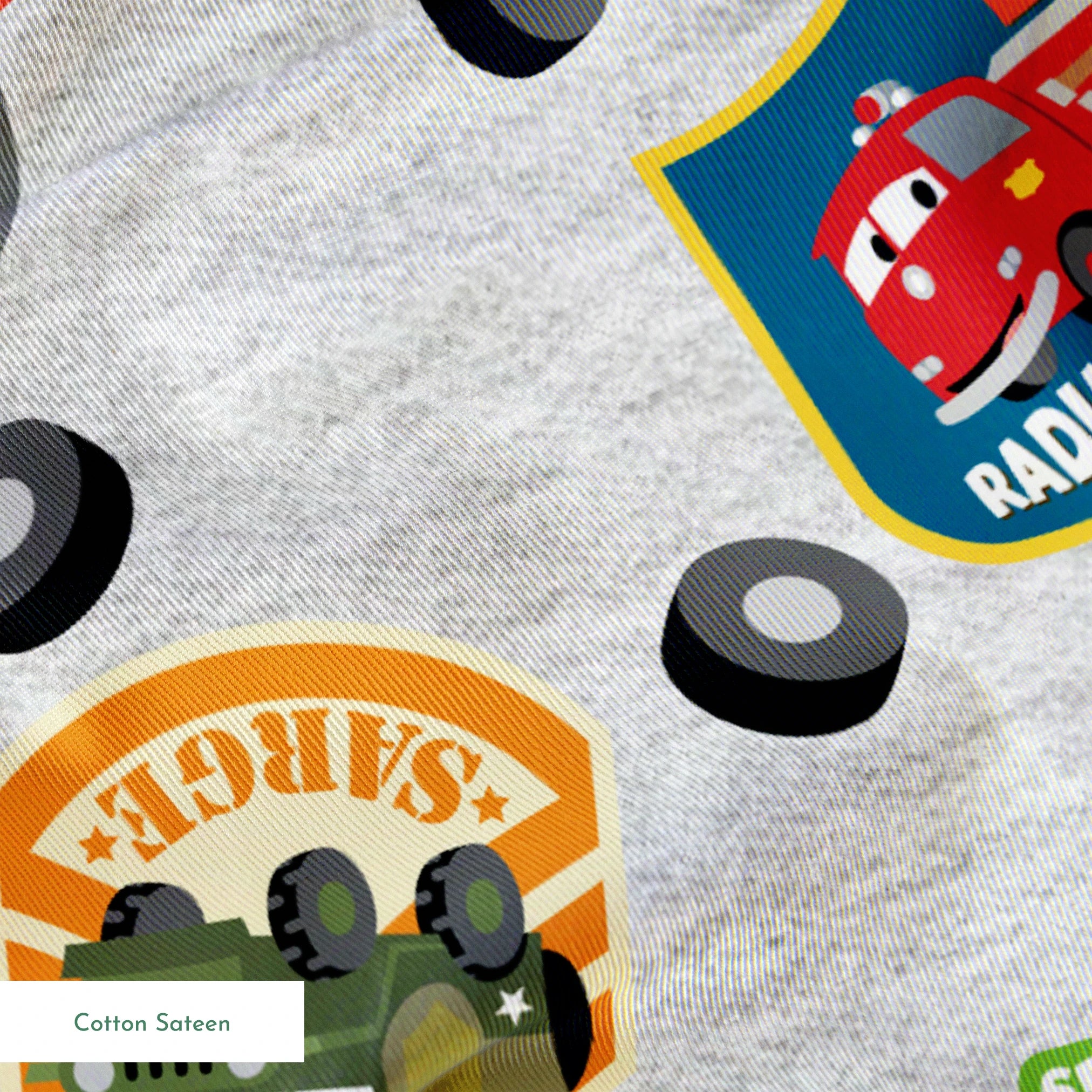 Cartoon vehicle characters on gray fabric with badges for Radiator Springs, Luigi's, and Sarge's springs sateen texture