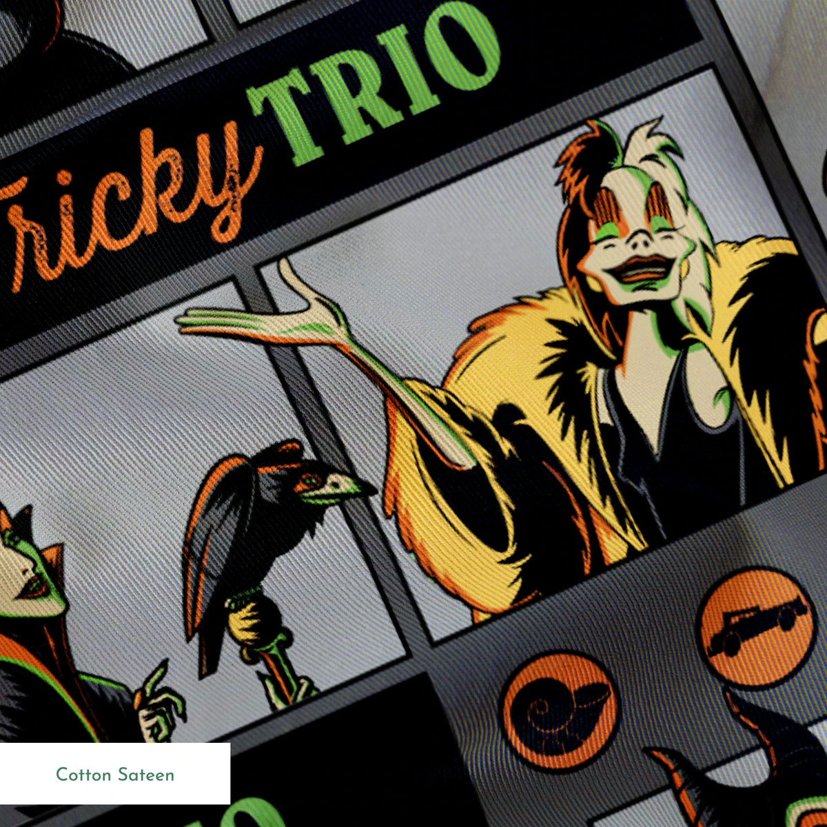 Cartoon-style villains "Tricky Trio" pattern with Maleficent, Cruella, and Ursula in green and orange text springs sateen texture