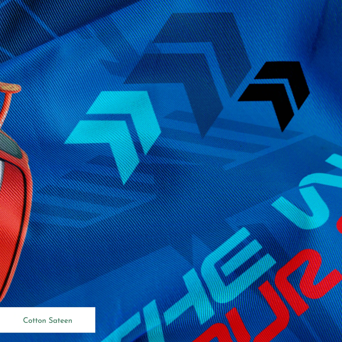Blue fabric pattern with animated red race cars, "The World of Cars" text, and directional arrow designs springs sateen texture