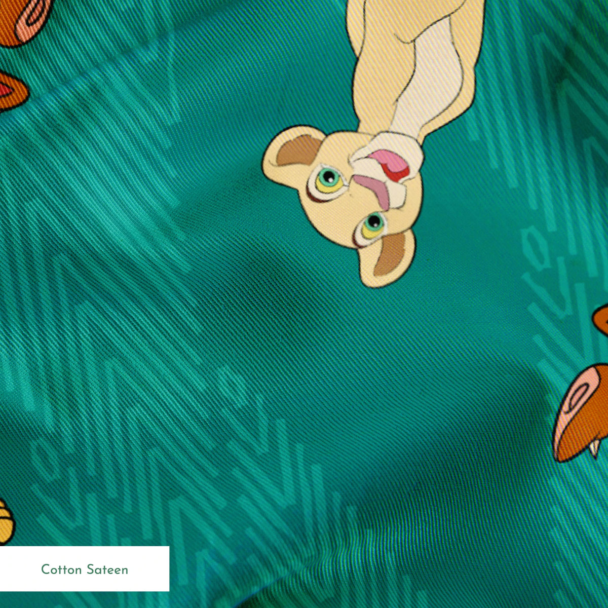Lion cubs in various poses on teal zigzag background; yellow, cream, and brown lions jumping and sitting springs sateen texture
