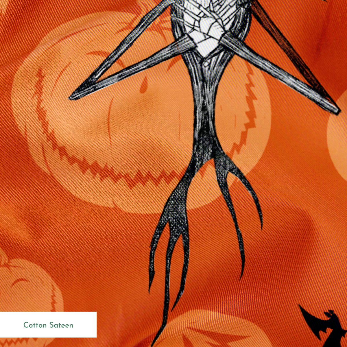 Nightmare Before Christmas pattern with Jack Skellington, bats, and jack-o'-lantern silhouettes on orange background springs sateen texture