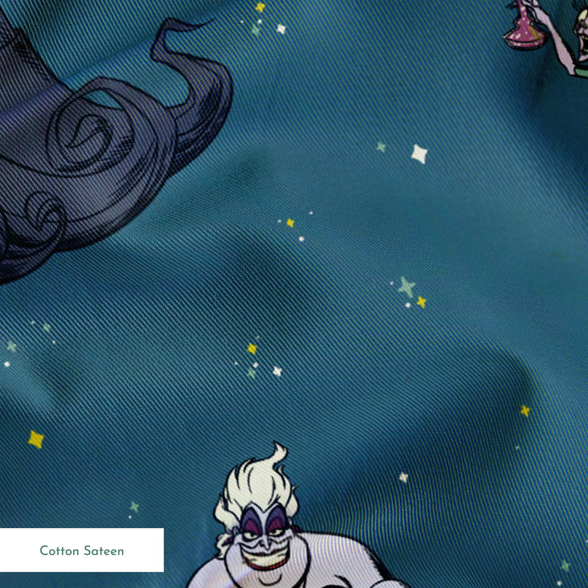 Disney villains pattern on teal background featuring Ursula, Maleficent, Cruella, and Scar in various poses springs sateen texture