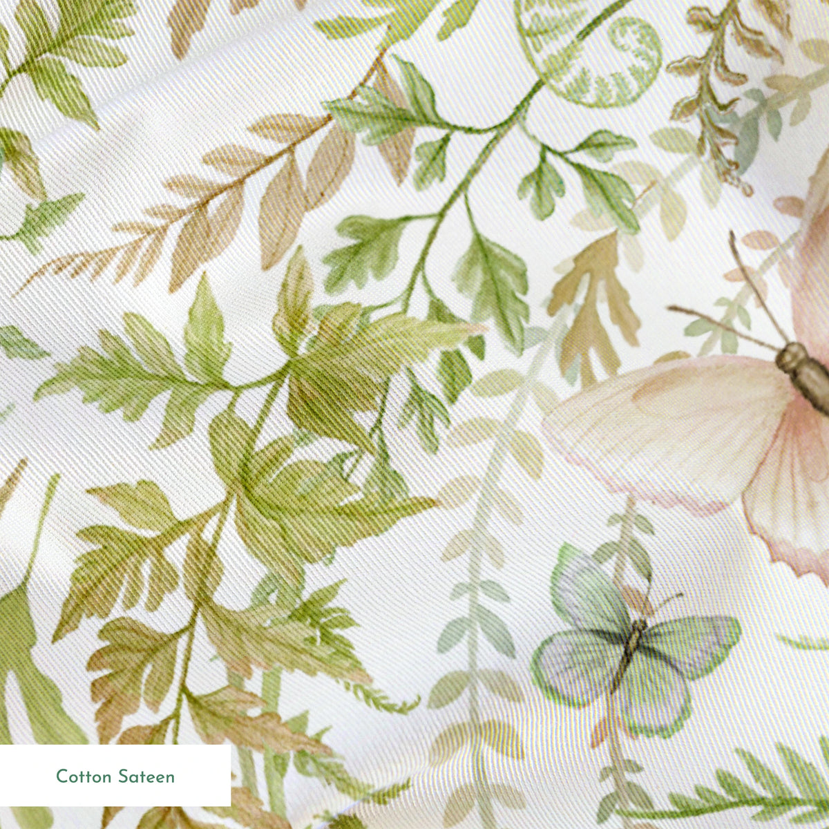 Circular botanical design featuring green ferns and blush butterflies on a white background in a Nicole Tamarin pattern. springs sateen texture