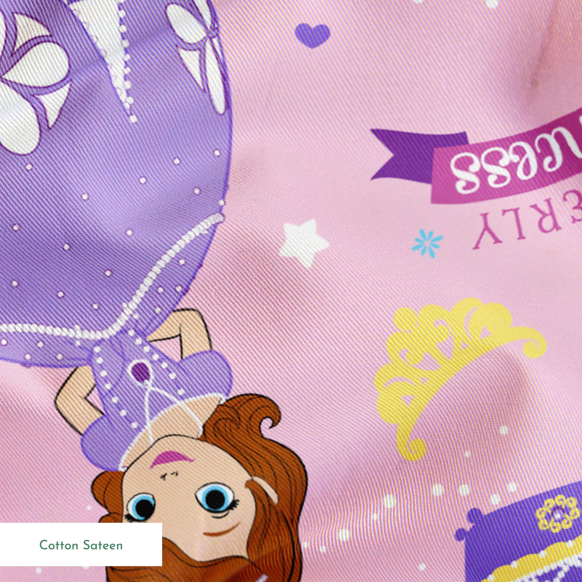 Princess-themed pattern with purple dresses, tiaras, teapots, and banners on pink background springs sateen texture