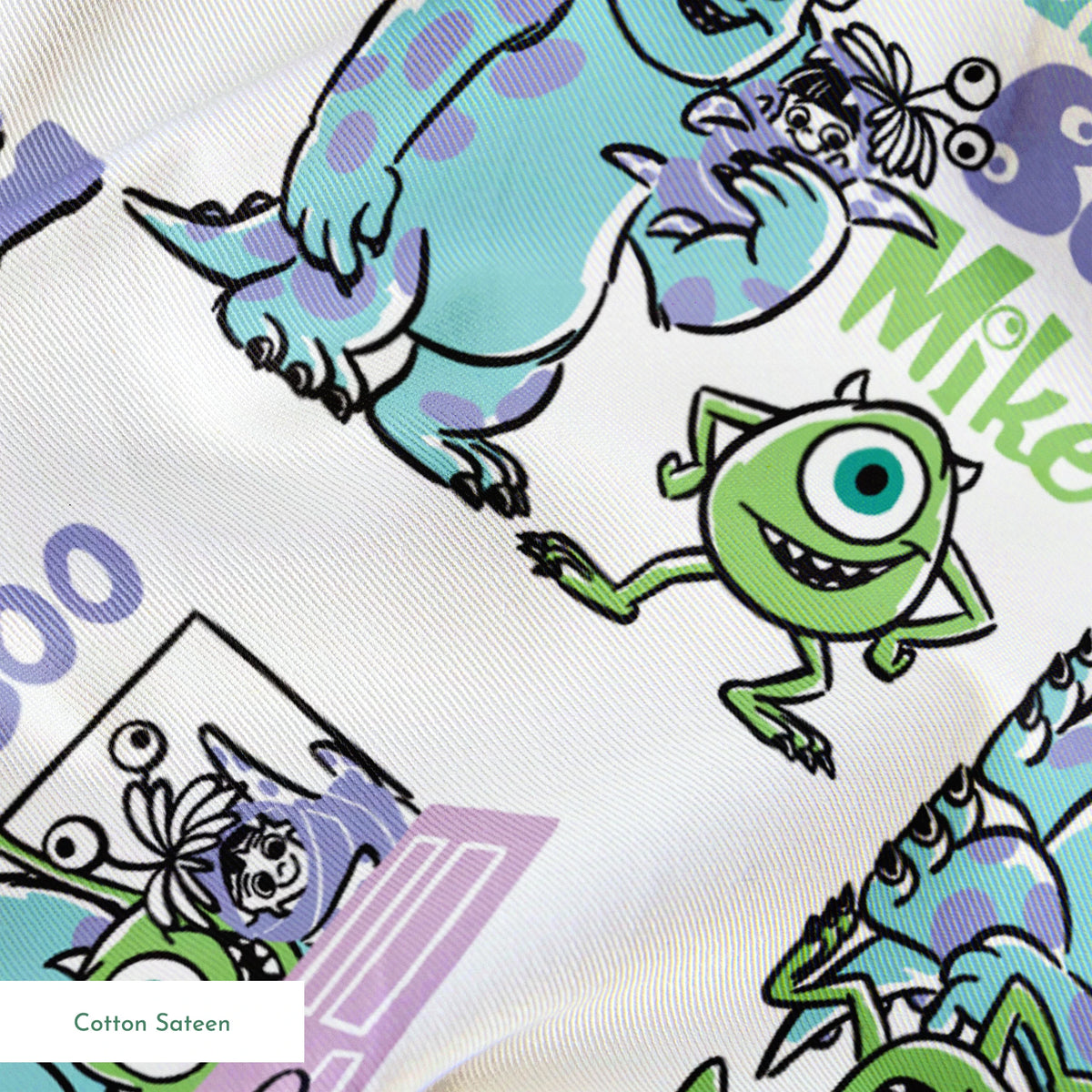 Monsters Inc pattern with Sulley and Mike characters in blue and green, with text like "Boo" and "Monsters" scattered throughout. springs sateen texture
